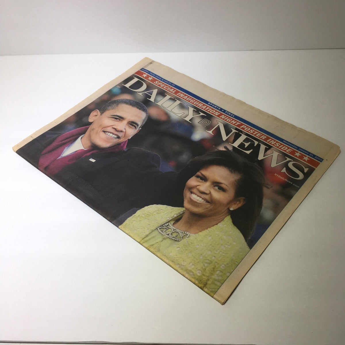 NY Daily News cover from January 19, 2009 displaying Barack Obama and Michelle Obama under the headline 'A Glorious Beginning', marking a significant moment in history.