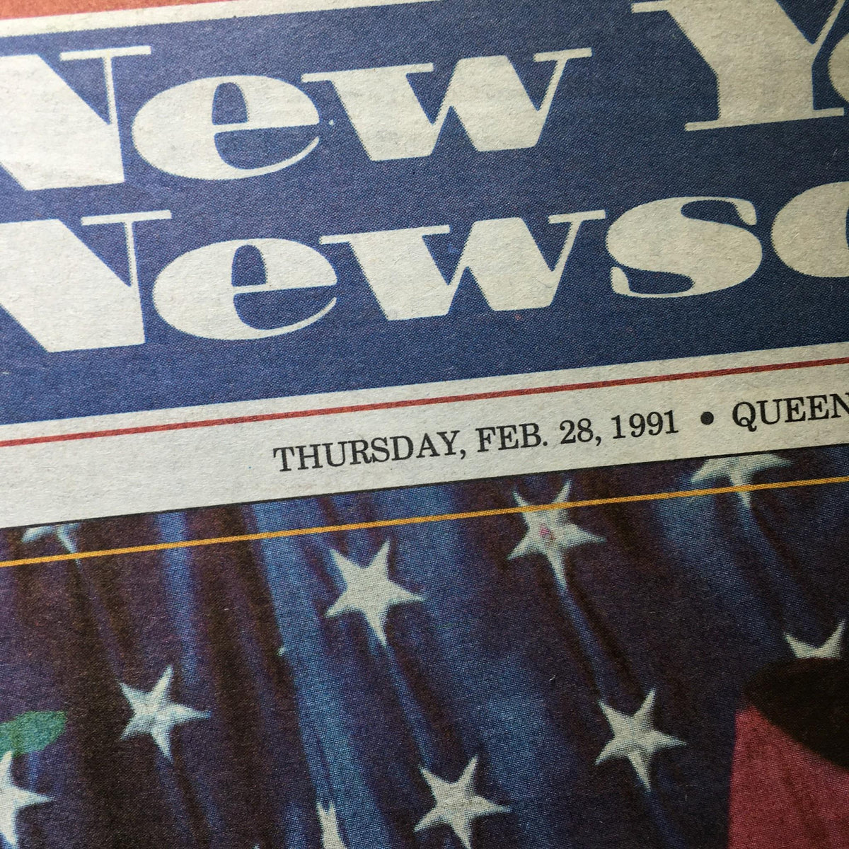 Close-up of the Newsday newspaper dated Thursday, February 28, 1991, showcasing the publication details and background stars.
