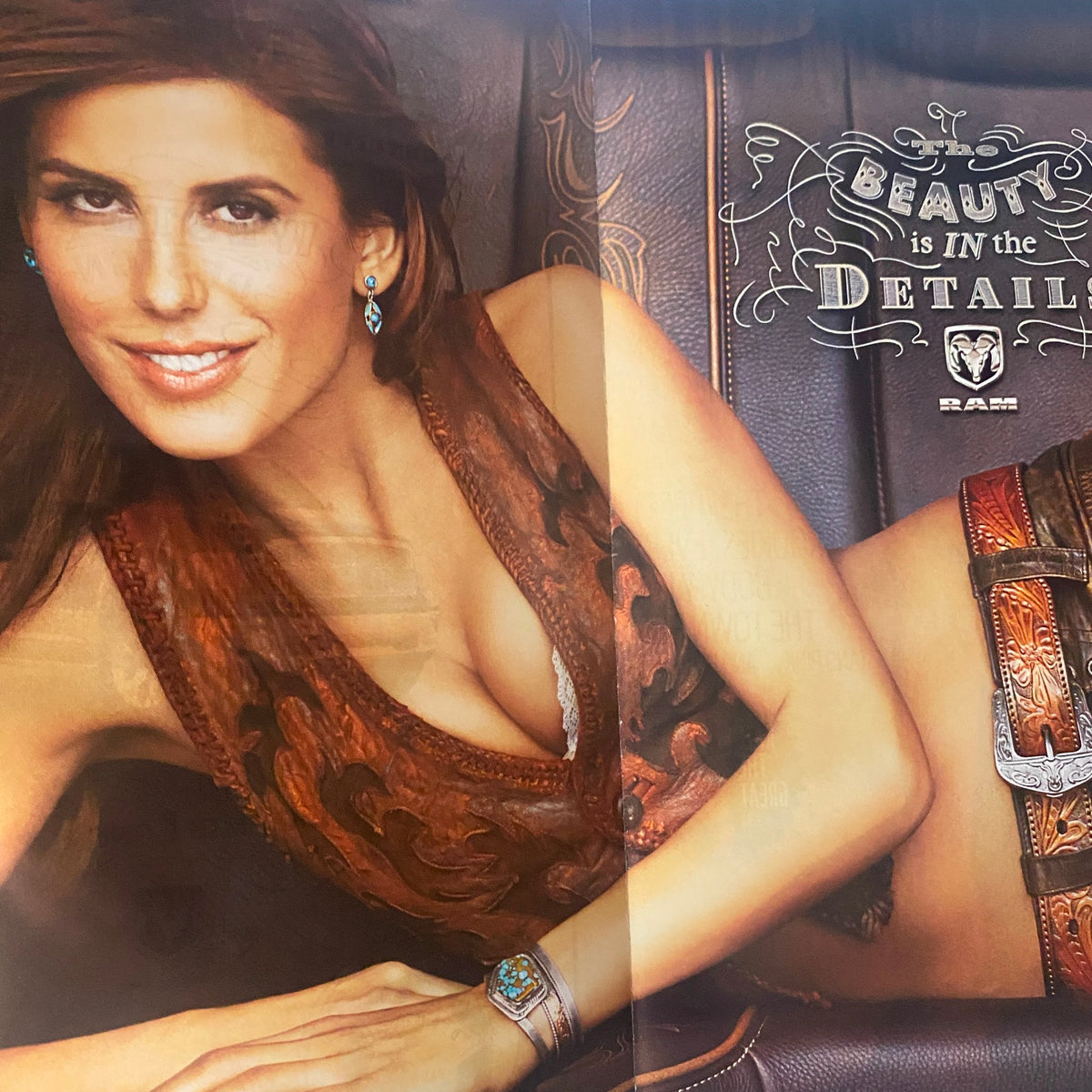 Advertisement from Sports Illustrated Magazine Winter 2011 featuring a beauty-themed promotional image showcasing a model with exquisite attire.
