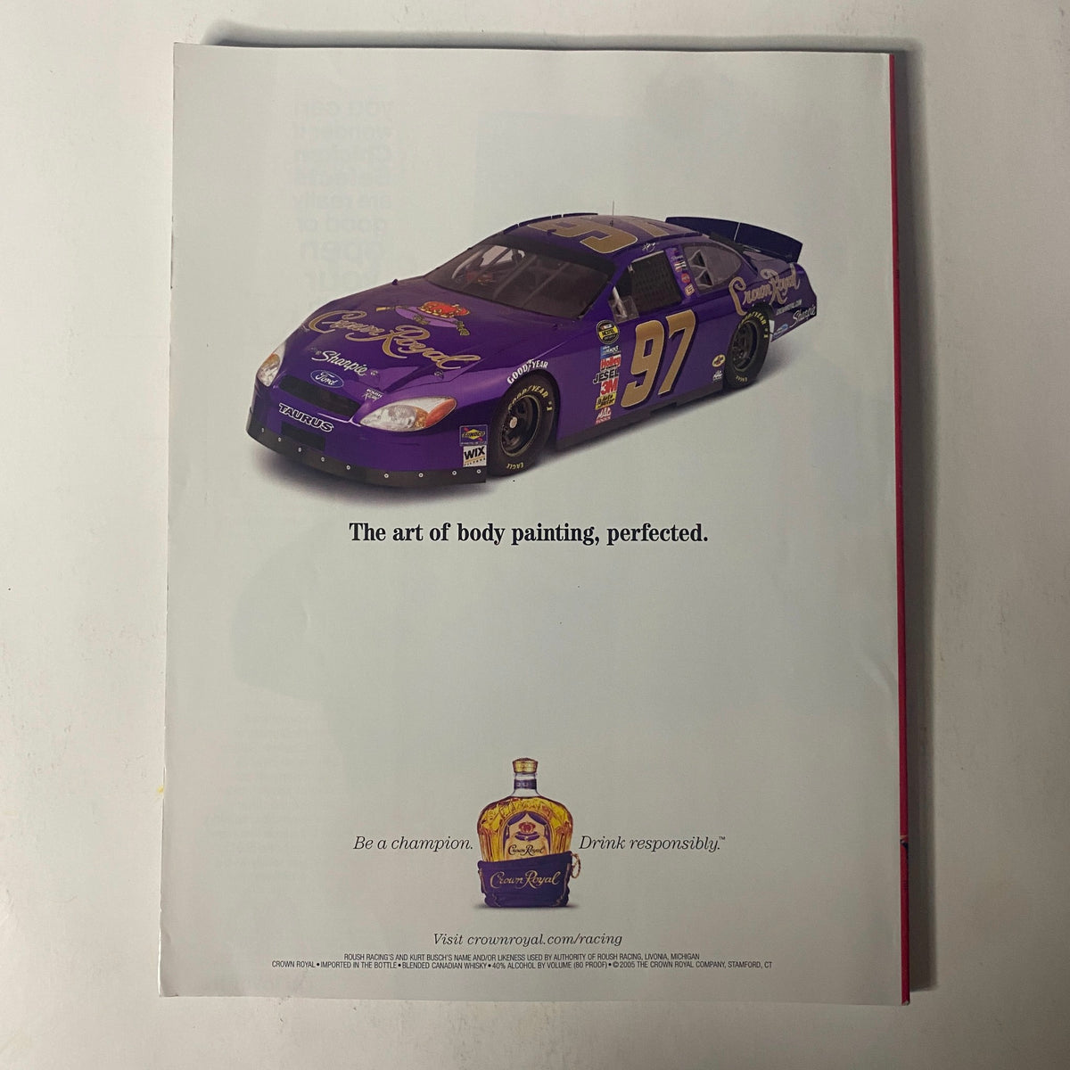 Advertisement featuring a purple NASCAR car, showcasing creative body painting, from the Sports Illustrated Magazine February 18, 2005 Carolyn Murphy Swimsuit Edition.