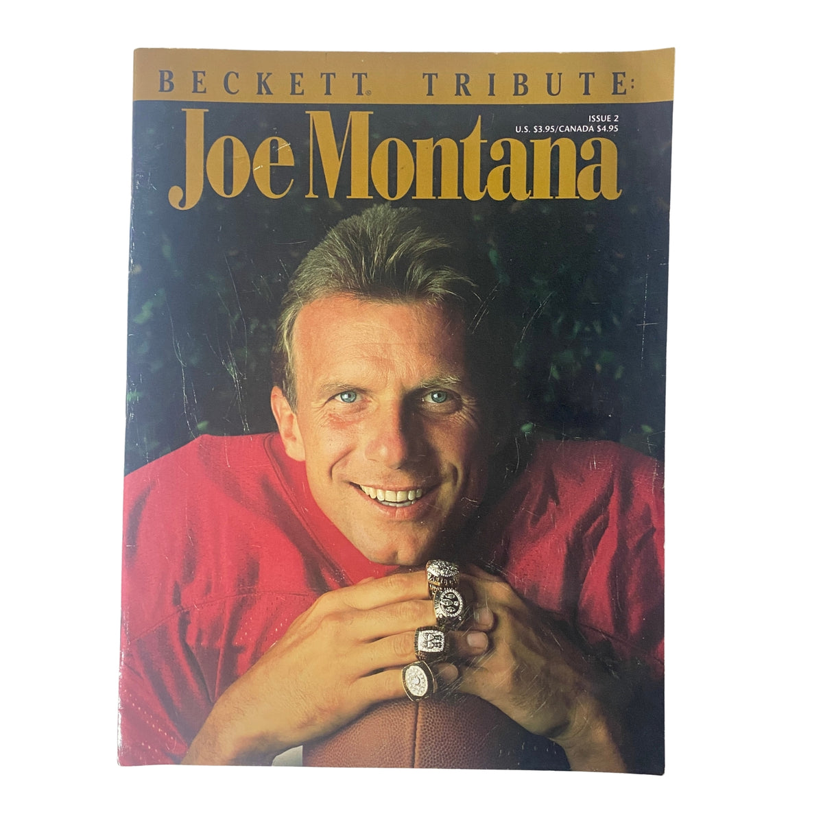 Cover of 1993 Beckett Magazine Issue 2 featuring Joe Montana, showcasing the iconic NFL quarterback with multiple Super Bowl rings, highlighting his legacy with the San Francisco 49ers.