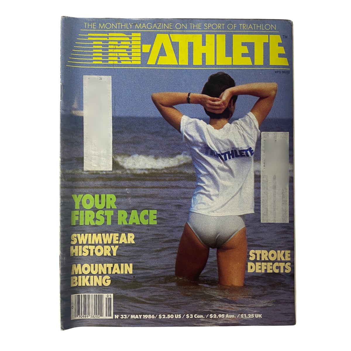 TriAthlete Magazine May 1986 cover featuring a woman in a swimsuit by the water, promoting articles on 'Your First Race', 'Swimwear History', and 'Stroke Defects'.