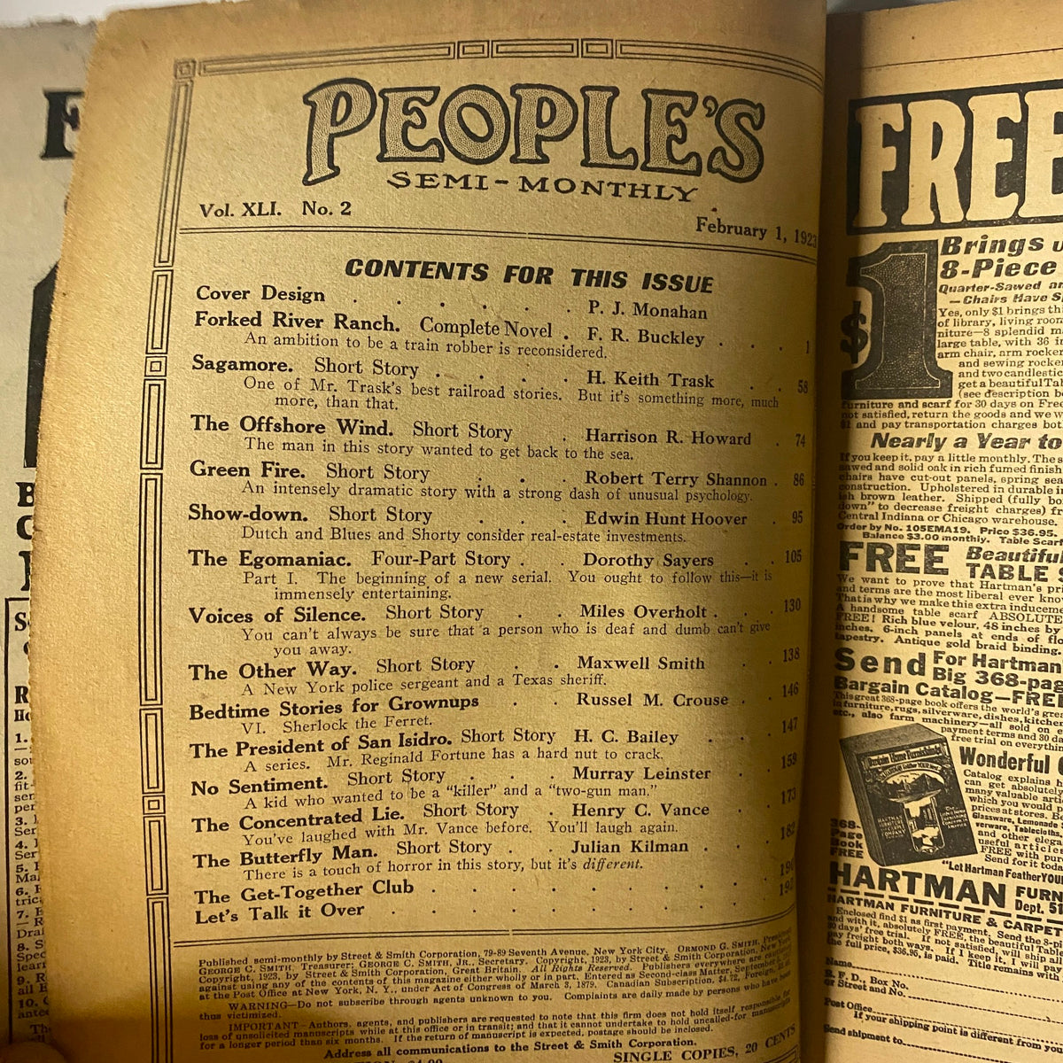 Table of contents page from People's Story Magazine, February 1, 1923 edition listing stories including 'Forked River Ranch' and 'Sagamore'.