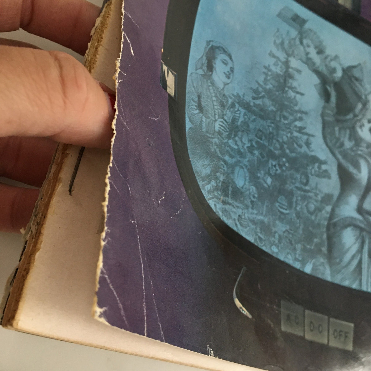 Side view of the spine of Show Magazine December 1961 Vol. 1 No. 3 highlighting the wear and vintage aesthetic typical of mid-20th century publications.