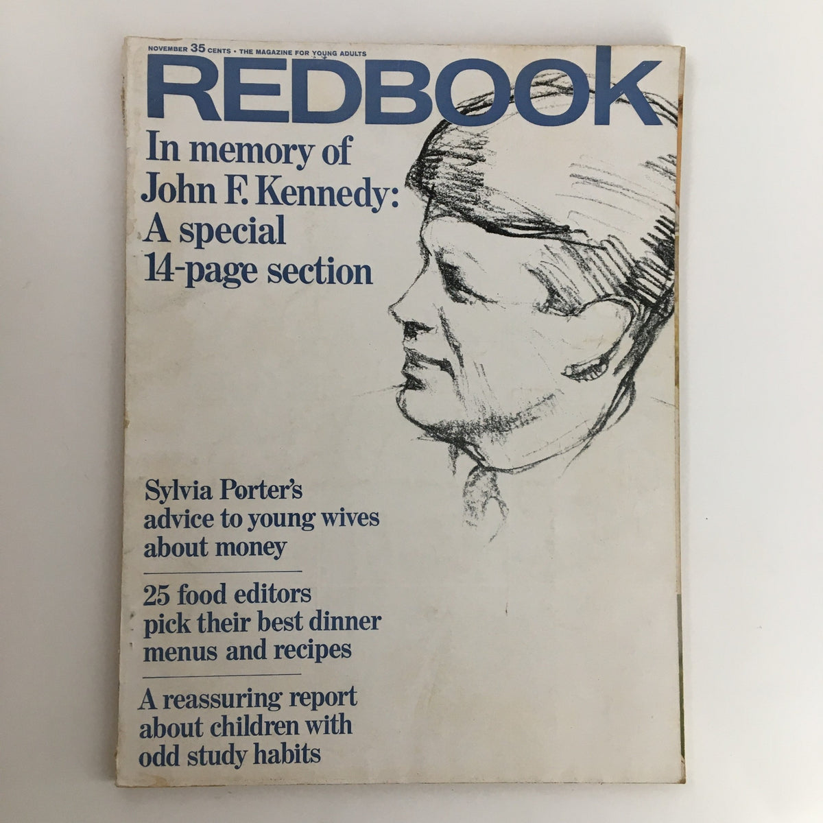 Redbook Magazine November 1964 cover featuring a tribute to John F. Kennedy with a sketch of his profile.