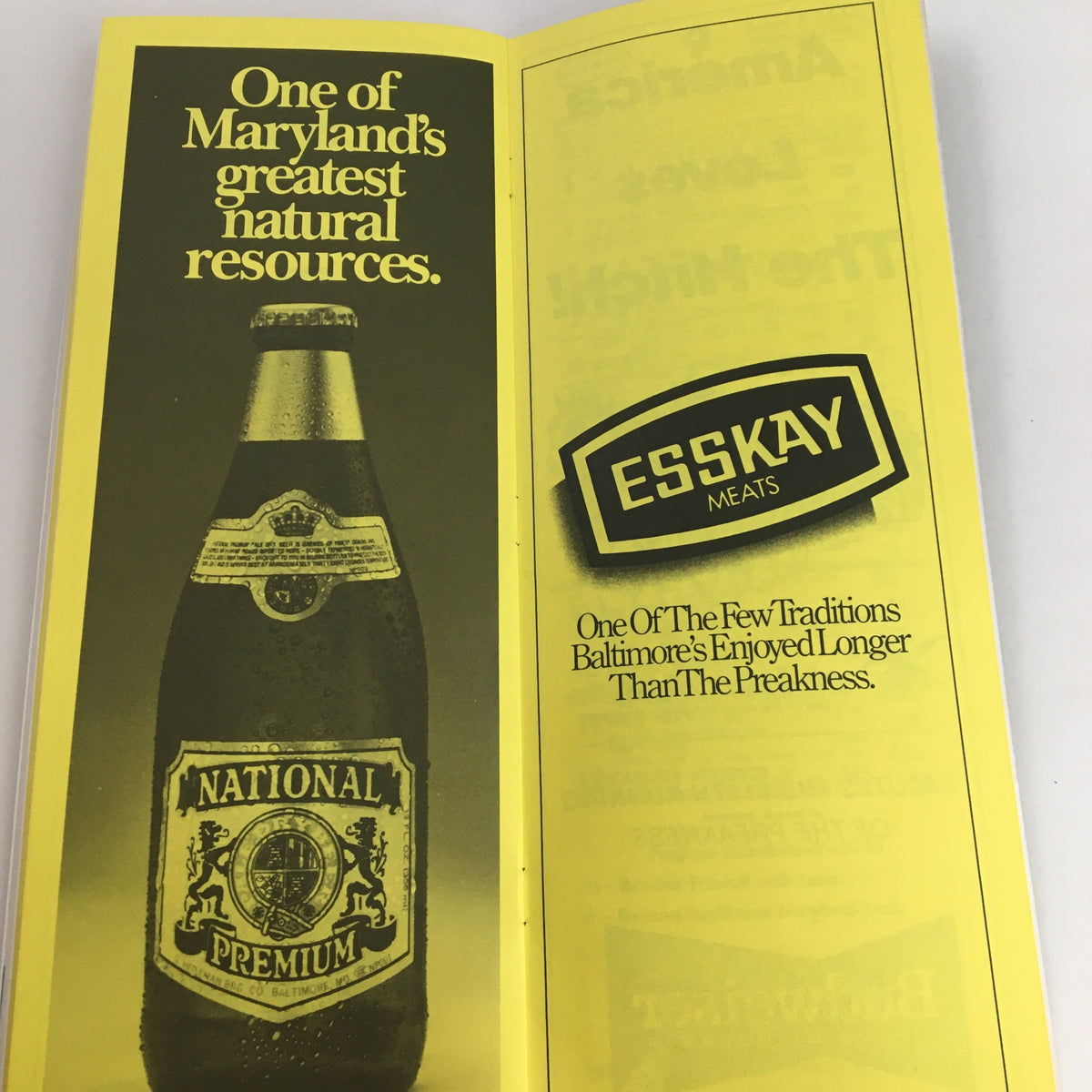 Advertisement for ESSKAY meats featured in the 1986 Pimlico Race Course The Preakness Official Souvenir Program, highlighting local traditions.