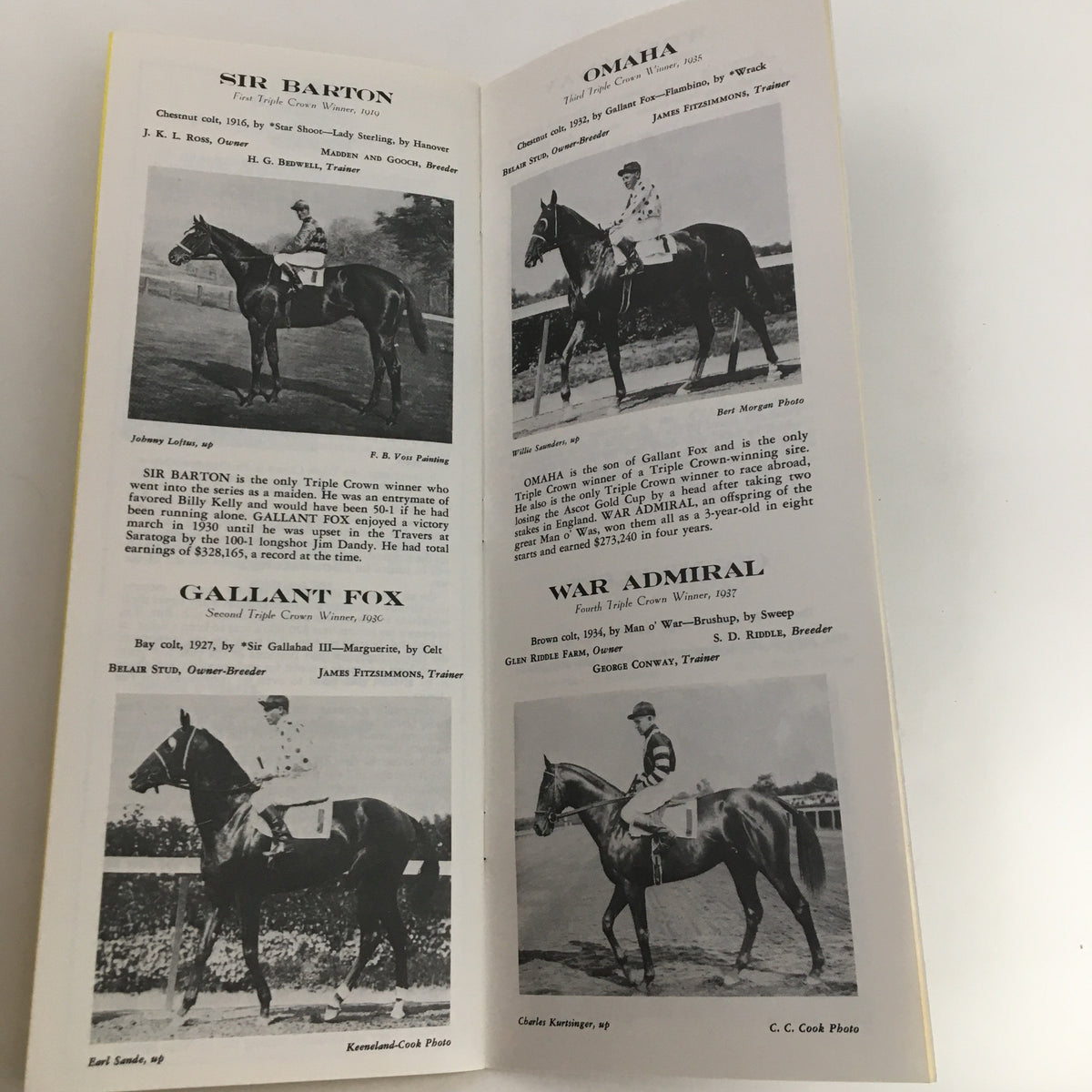 1986 Pimlico Race Course The Preakness Official Souvenir Program featuring historical profiles of Triple Crown winners including Sir Barton, Gallant Fox, Omaha, and War Admiral.