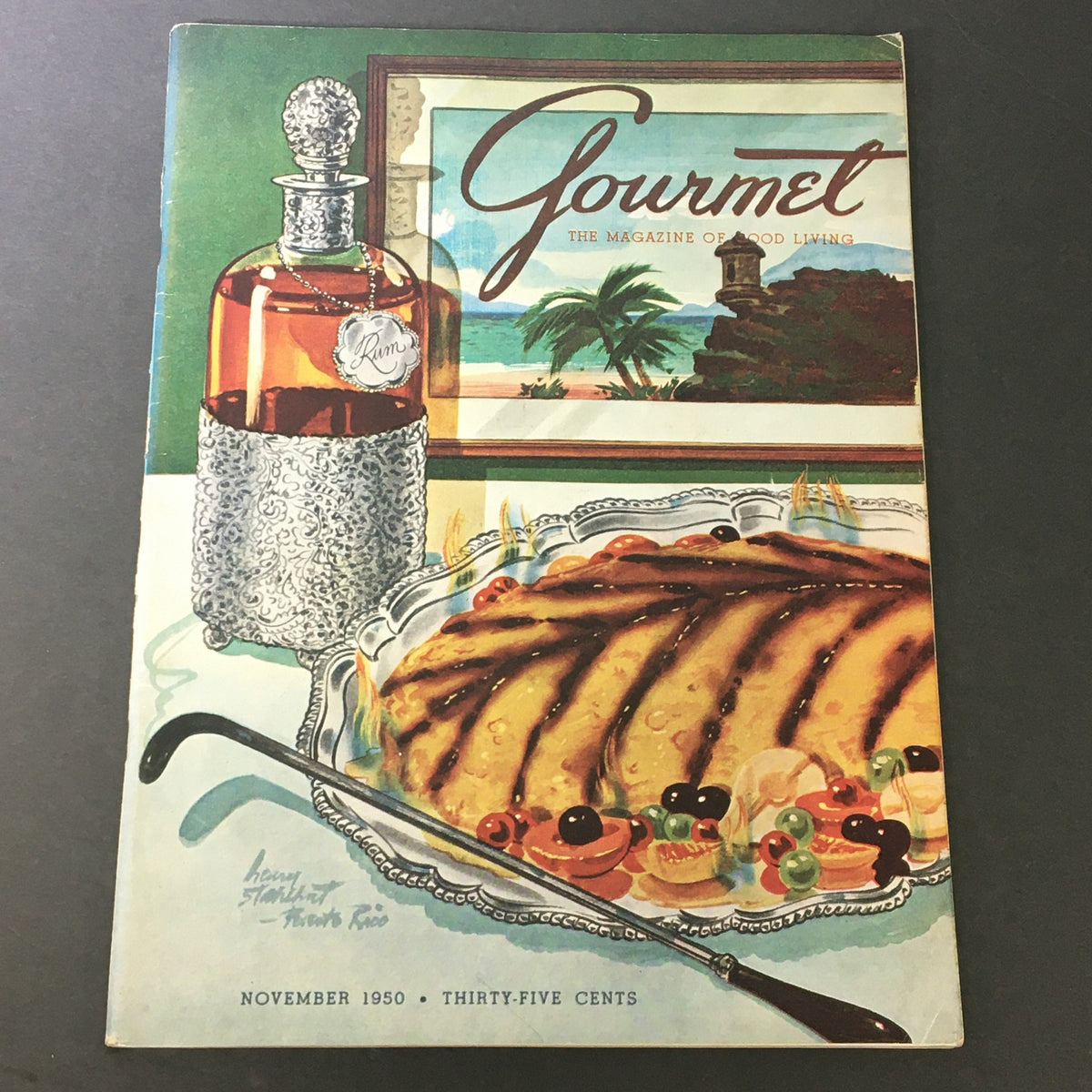 Cover of VTG Gourmet Magazine, November 1950 - It's A Long Christmas, featuring a colorful illustration of gourmet food and rum, encapsulating the essence of vintage culinary living.