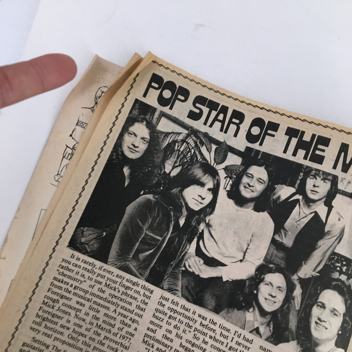 Close-up of 'Pop Star of the Month' article in Song Hits Magazine January 1978 about Foreigner, highlighting band members and their stories.