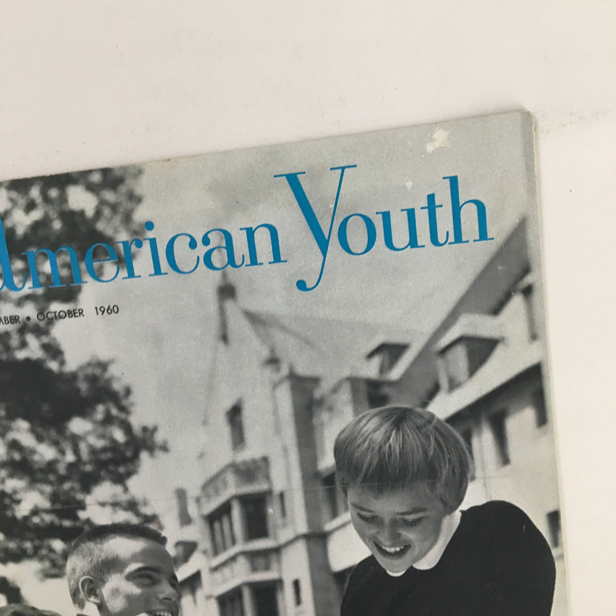 Close-up of the cover of VTG American Youth Magazine September 1960 highlighting the title and teens in front of a university.