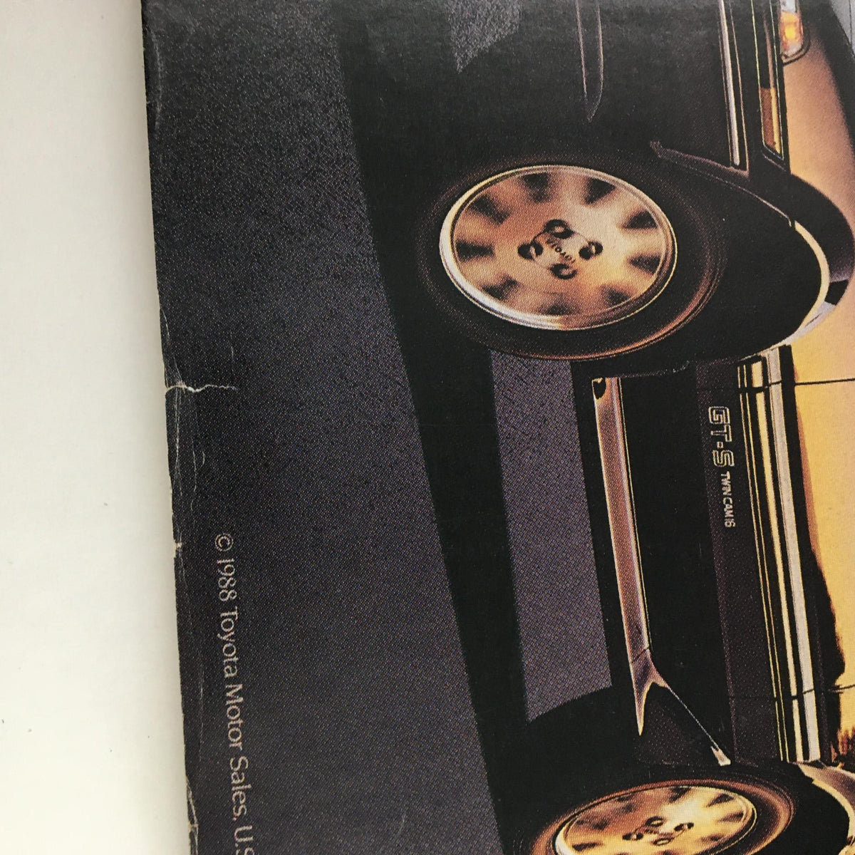 Close-up of a vintage car tire and wheel featured in the Rolling Stone Magazine November 17, 1988, showcasing its retro design and aesthetics, alongside iconic artists like Guns N' Roses, James Brown, and Mick Jagger.
