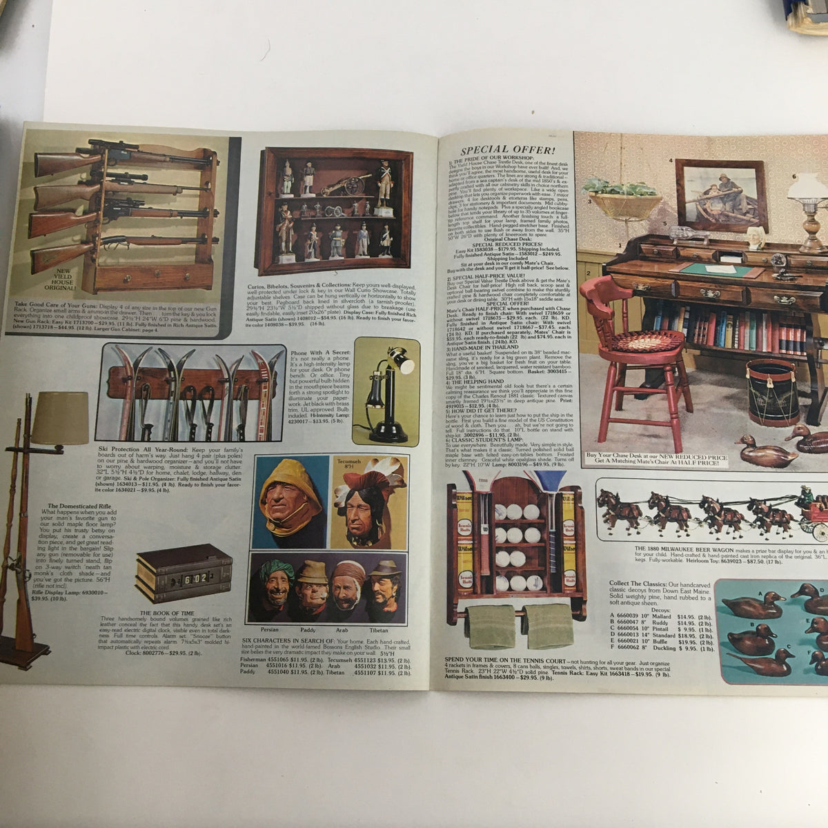 Assorted decorative items and furniture from Yield House Quality Pine Furniture & Accessories Catalog, including racks, a desk, and unique collectibles that reflect rustic home decor style.