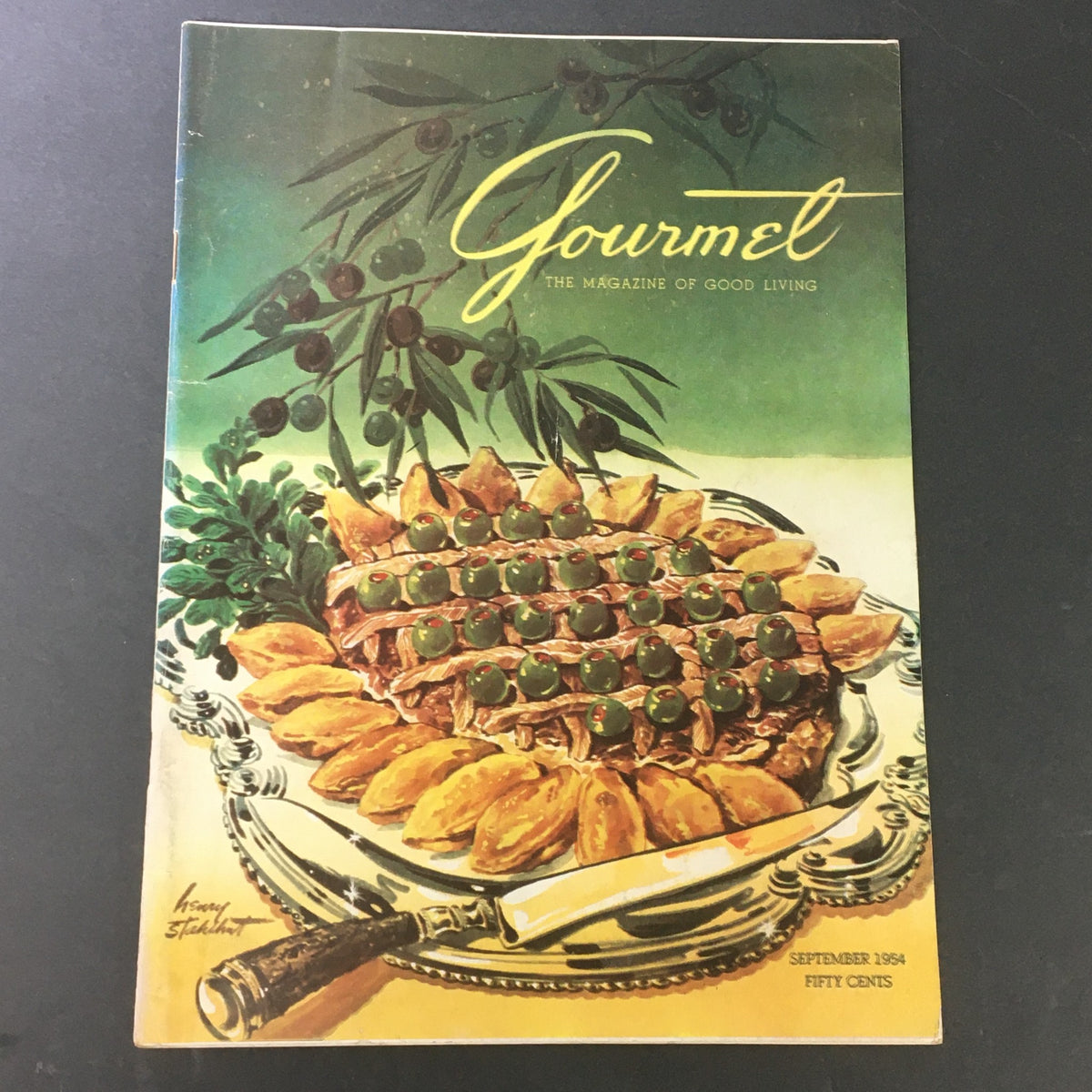 Cover of VTG Gourmet The Magazine of Good Living, September 1954 edition, featuring an artistic display of gourmet food with pastries and olives on a decorative plate.