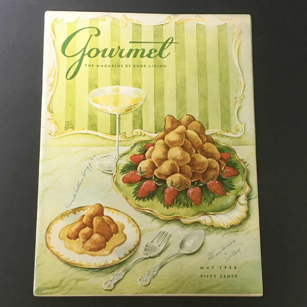 Cover of VTG Gourmet The Magazine of Good Living May 1956 featuring a strawberry dessert and champagne, showcasing culinary art from mid-century.