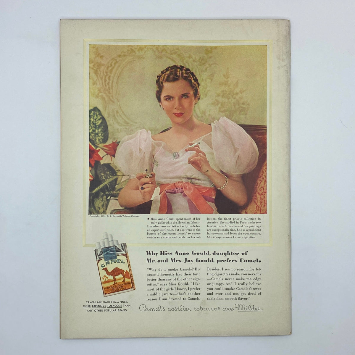 Vintage advertisement featuring Miss Anne Gould, daughter of Mr. and Mrs. Jay Gould, discussing her preference for Camel cigarettes. The advertisement is set against an elegant background, emphasizing the sophistication of 1930s marketing. Title: The New Yorker Complete Magazine June 16, 1934 Constantin Alajalov Cover VG.