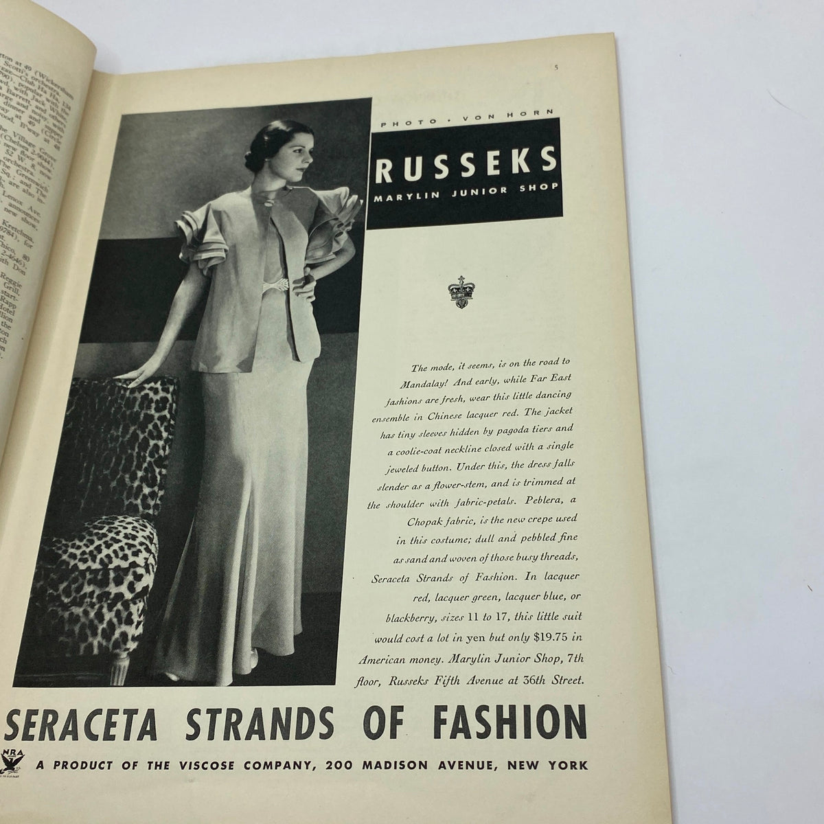 Fashion advertisement from The New Yorker Complete Magazine September 23, 1933 for Russek's featuring a model in elegant attire, highlighting vintage fashion trends.