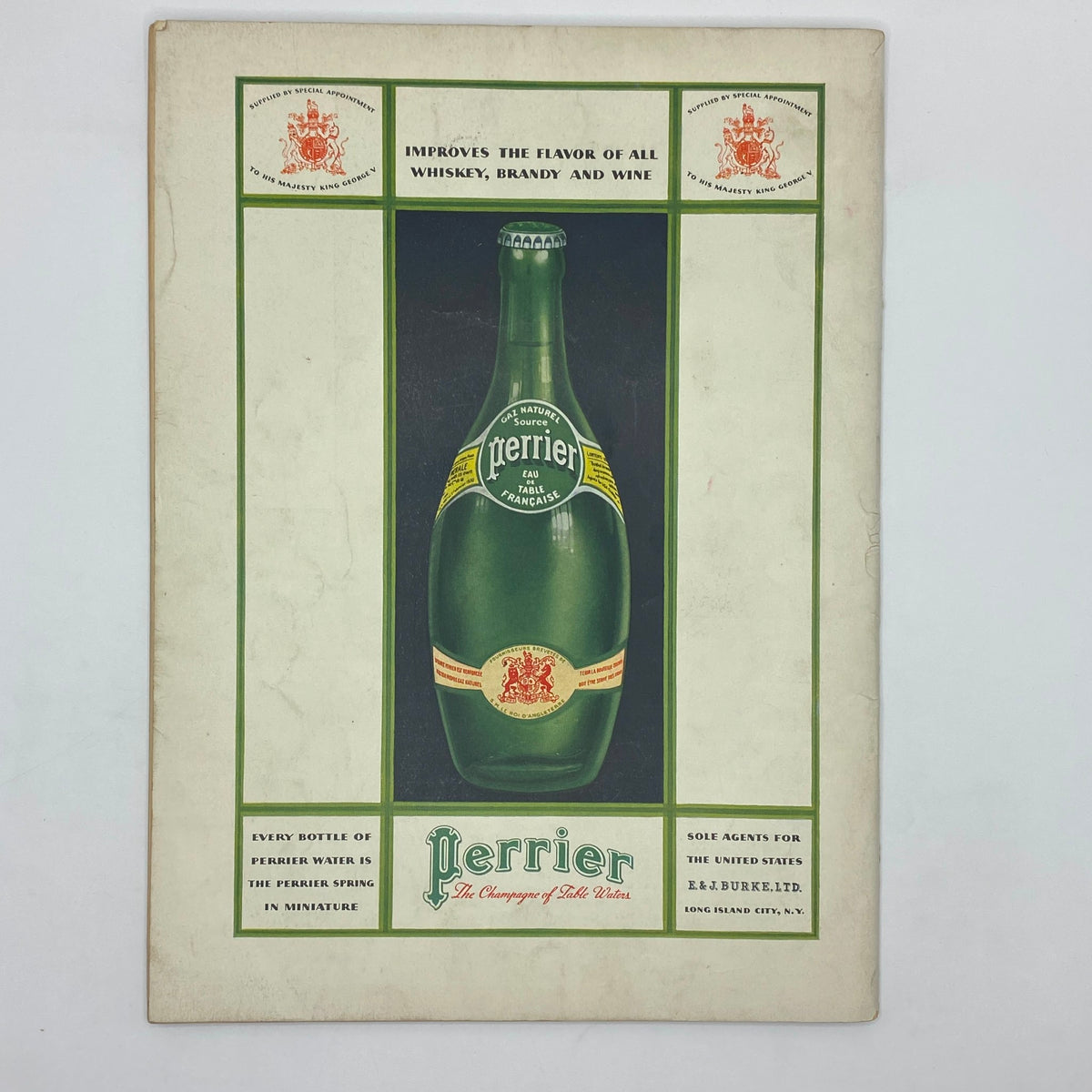 Advertisement for Perrier featuring a vintage green glass bottle, highlighting its quality as 'the Champagne of Table Waters,' from The New Yorker magazine, May 12, 1934.