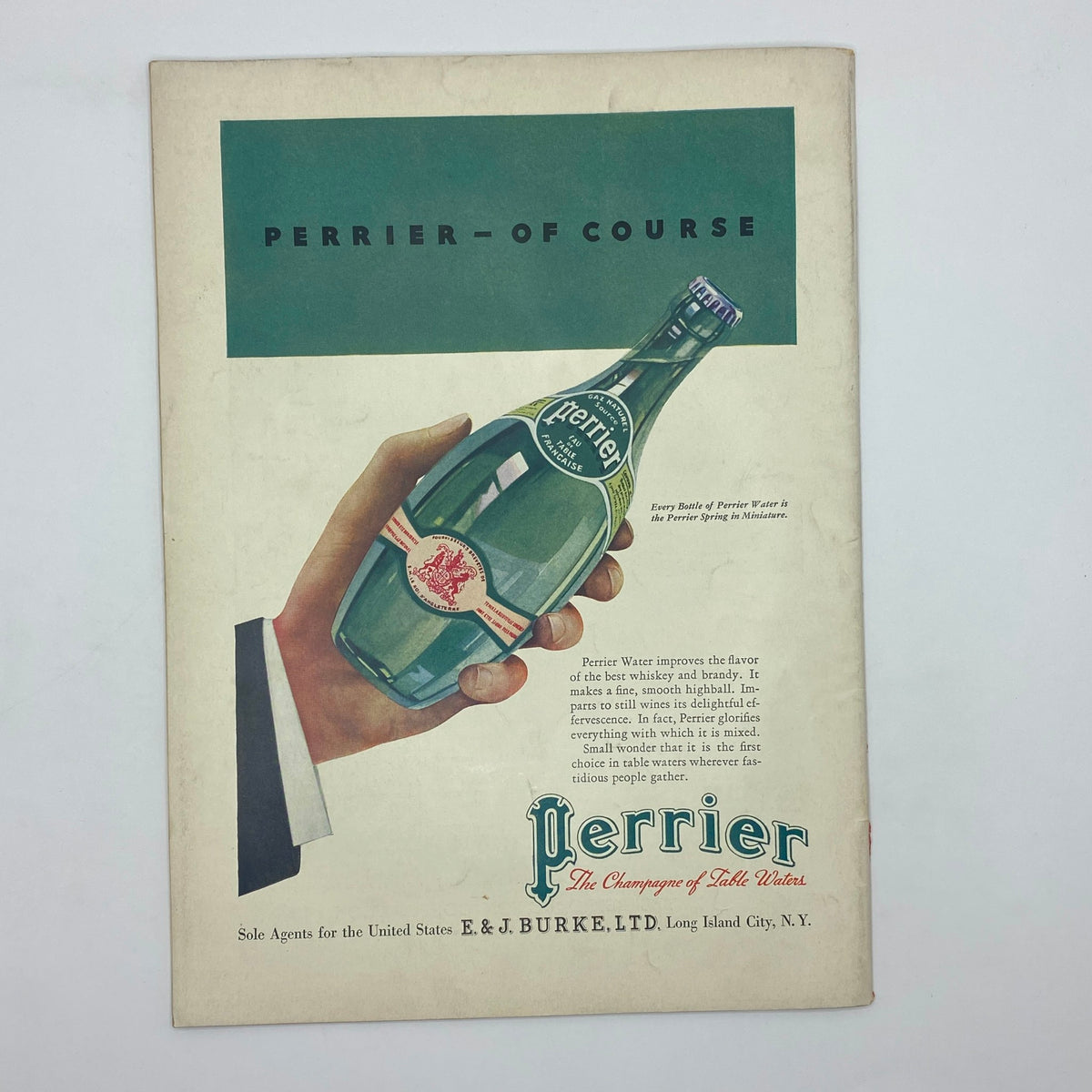 Back cover of The New Yorker Complete Magazine June 30, 1934 featuring an advertisement for Perrier water, illustrating a hand holding a Perrier bottle with elegant branding.