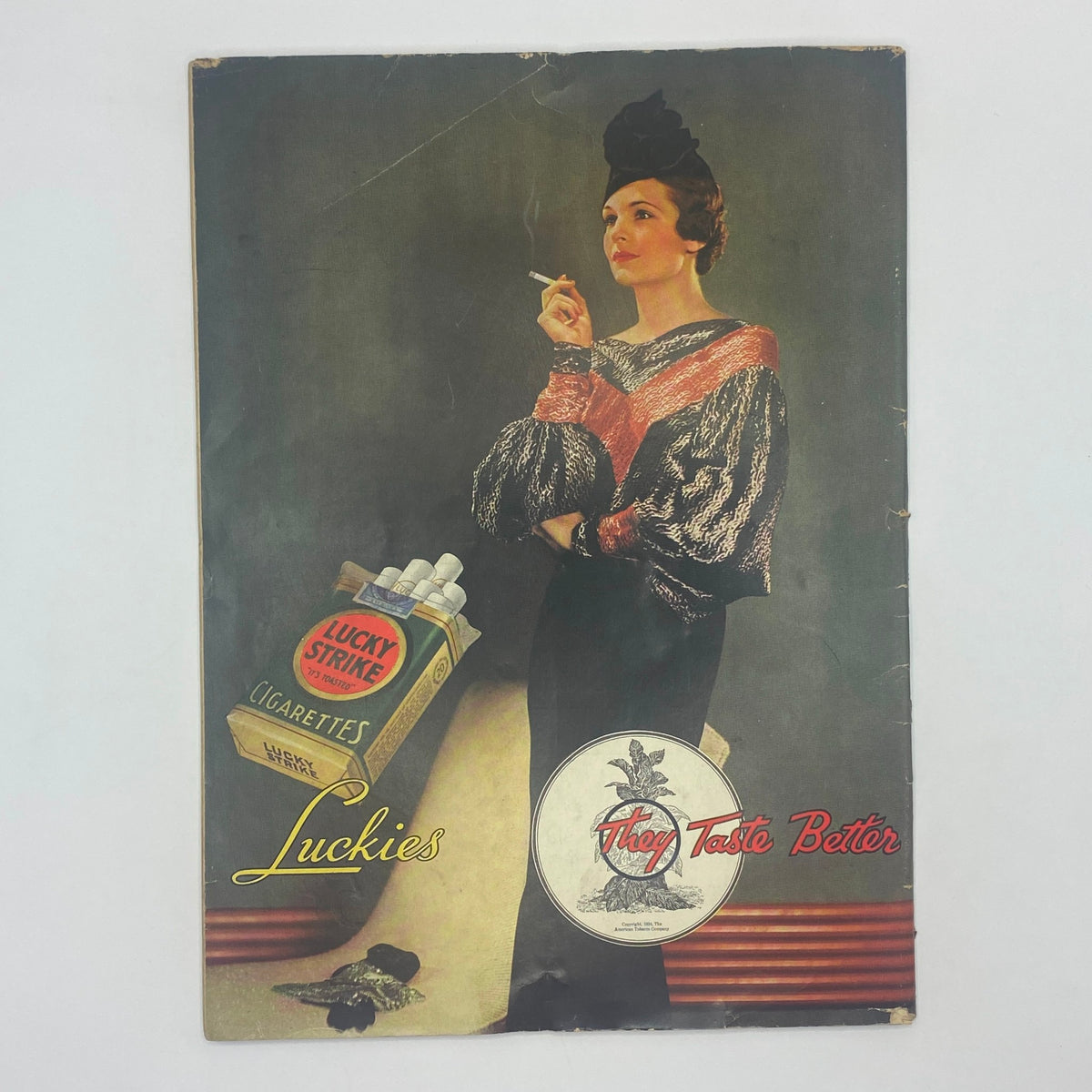 Cover page of an advertisement for Lucky Strike cigarettes from The New Yorker magazine January 5, 1935, featuring a woman in vintage fashion enjoying a cigarette.