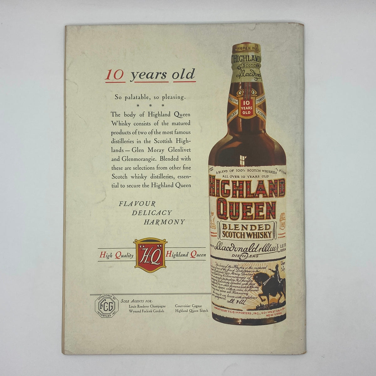 Vintage advertisement for Highland Queen Blended Scotch Whisky from The New Yorker Complete Magazine June 29, 1935, highlighting its rich flavor and quality with an artistic bottle illustration.
