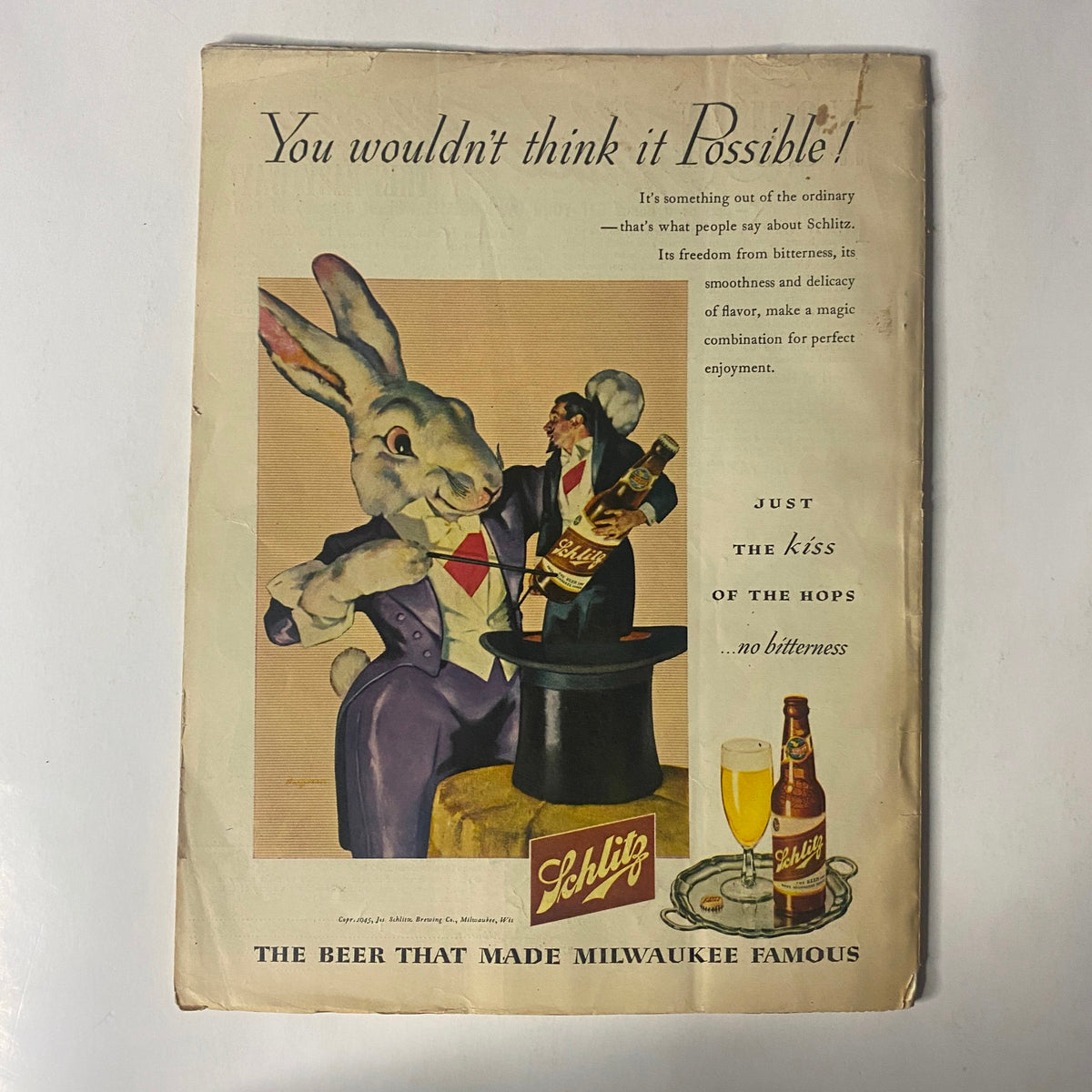 Back cover of Radio Romances Magazine, August 1945, featuring an illustration of a rabbit and a Schlitz beer advertisement, highlighting vintage promotional art.