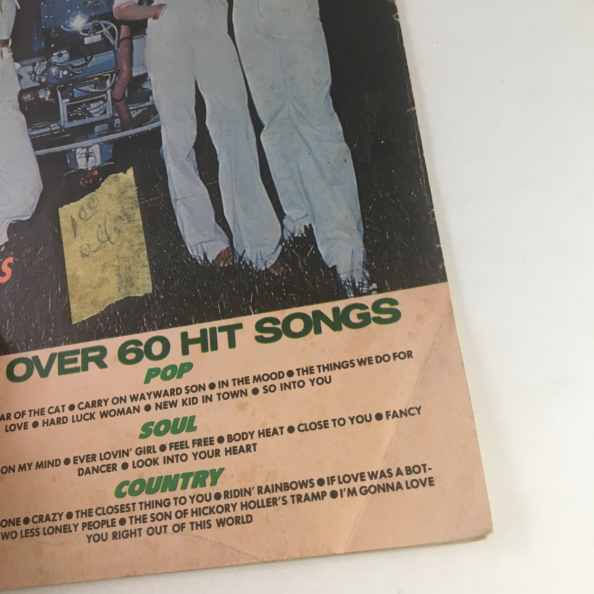 Detailed view of the Song Hits Magazine May 1977 cover, highlighting over 60 hit songs and featuring artists ABBA, Johnny Bristol, and Waylon Jennings.