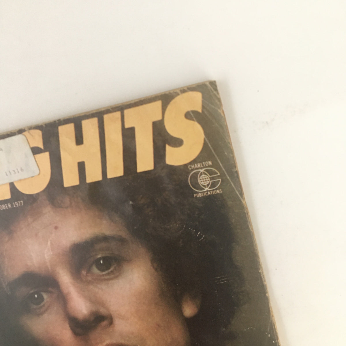 Detailed close-up of Song Hits Magazine October 1977 showing the magazine title and artist Leo Sayer, revealing vintage elements.