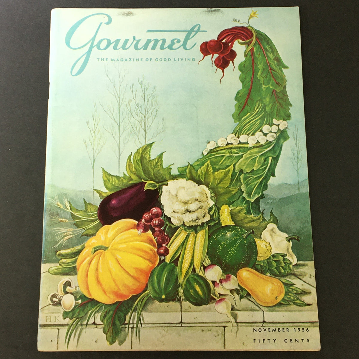 VTG Gourmet The Magazine of Good Living November 1956 cover featuring a beautifully illustrated arrangement of vegetables and Autumn harvest, showcasing mid-century dining aesthetics.