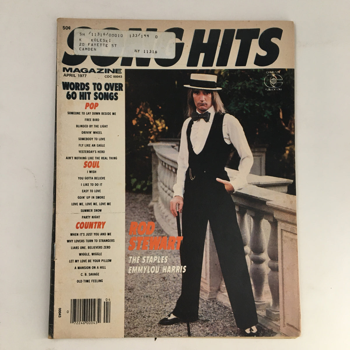 Cover of Song Hits Magazine April 1977 featuring Rod Stewart, The Staples, and Emmylou Harris, showcasing music history from the late '70s.