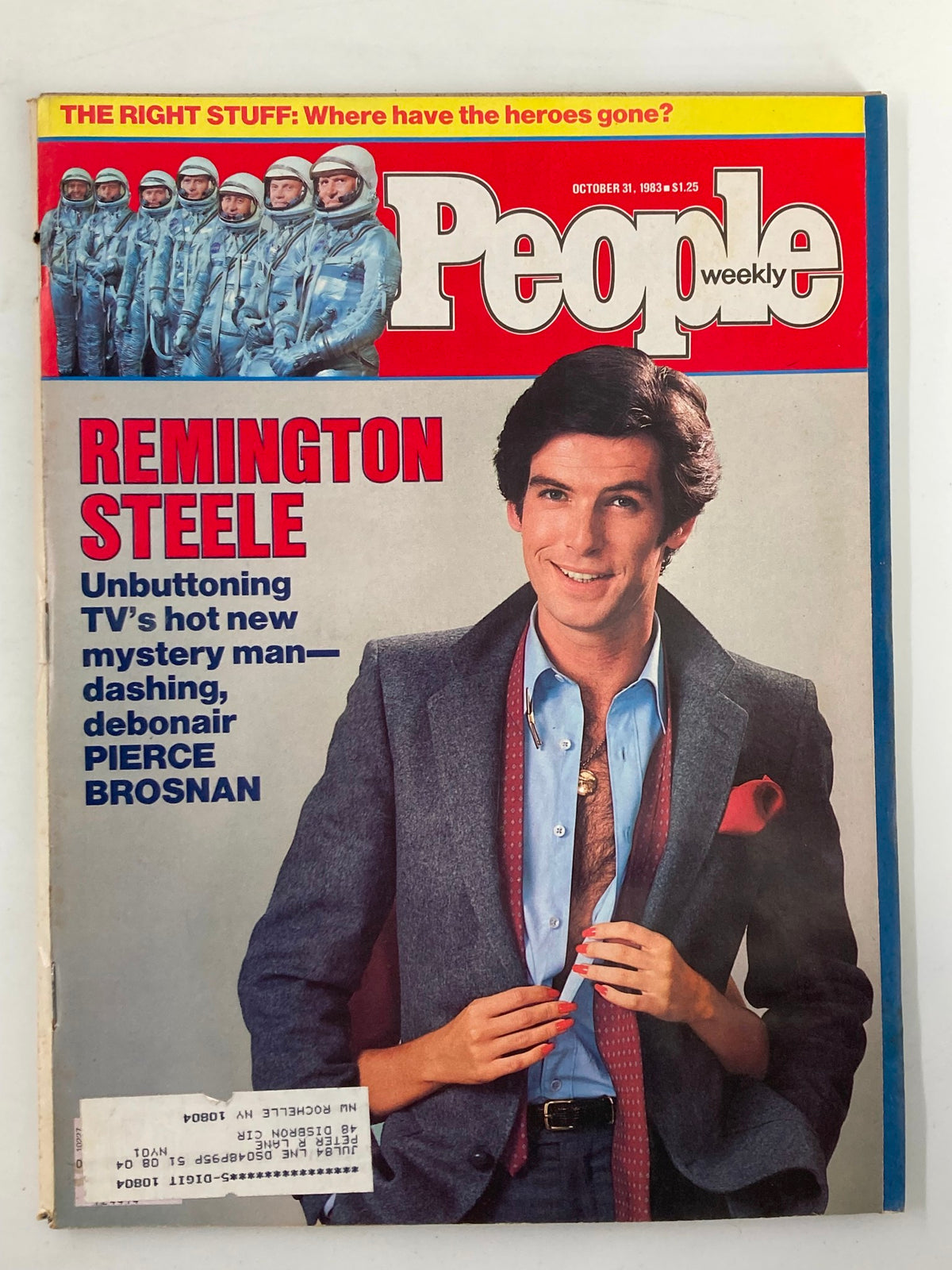 Cover of People Weekly Magazine, October 31, 1983, featuring Pierce Brosnan as Remington Steele, alongside a group of astronauts in suits.