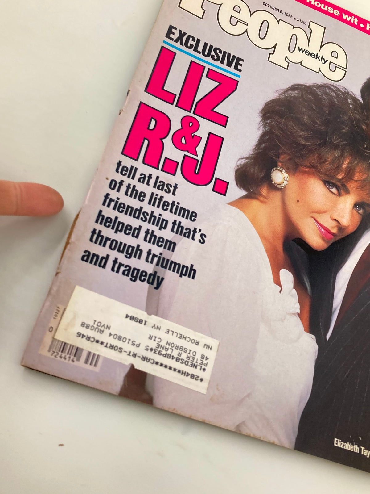 Cover of the People Weekly Magazine from October 6, 1986 featuring Elizabeth Taylor, with bold text reading 'EXCLUSIVE LIZ & R.J.' highlighting their friendship, encapsulating the essence of 1980s pop culture.
