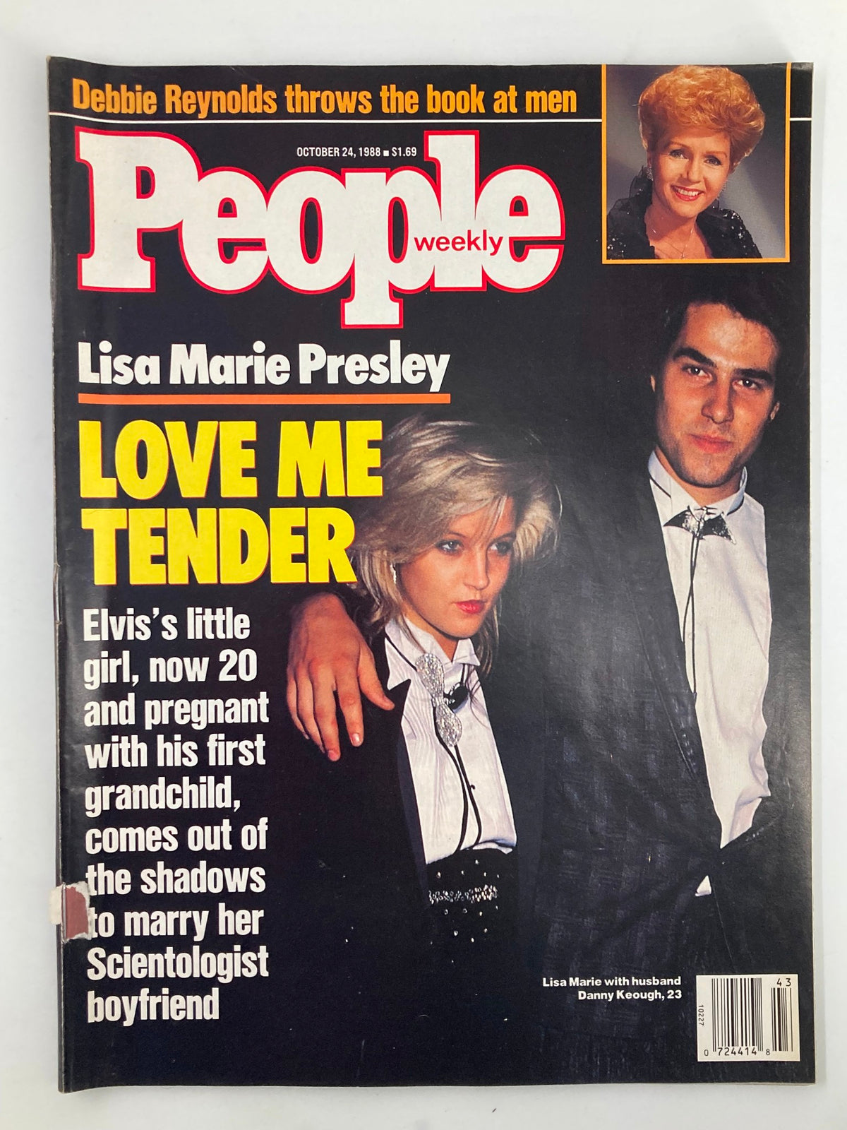 Cover of People Weekly Magazine from October 24, 1988, featuring Lisa Marie Presley and Danny Keough with the headline 'LOVE ME TENDER'. The magazine showcases the iconic couple amidst 1980s celebrity culture.