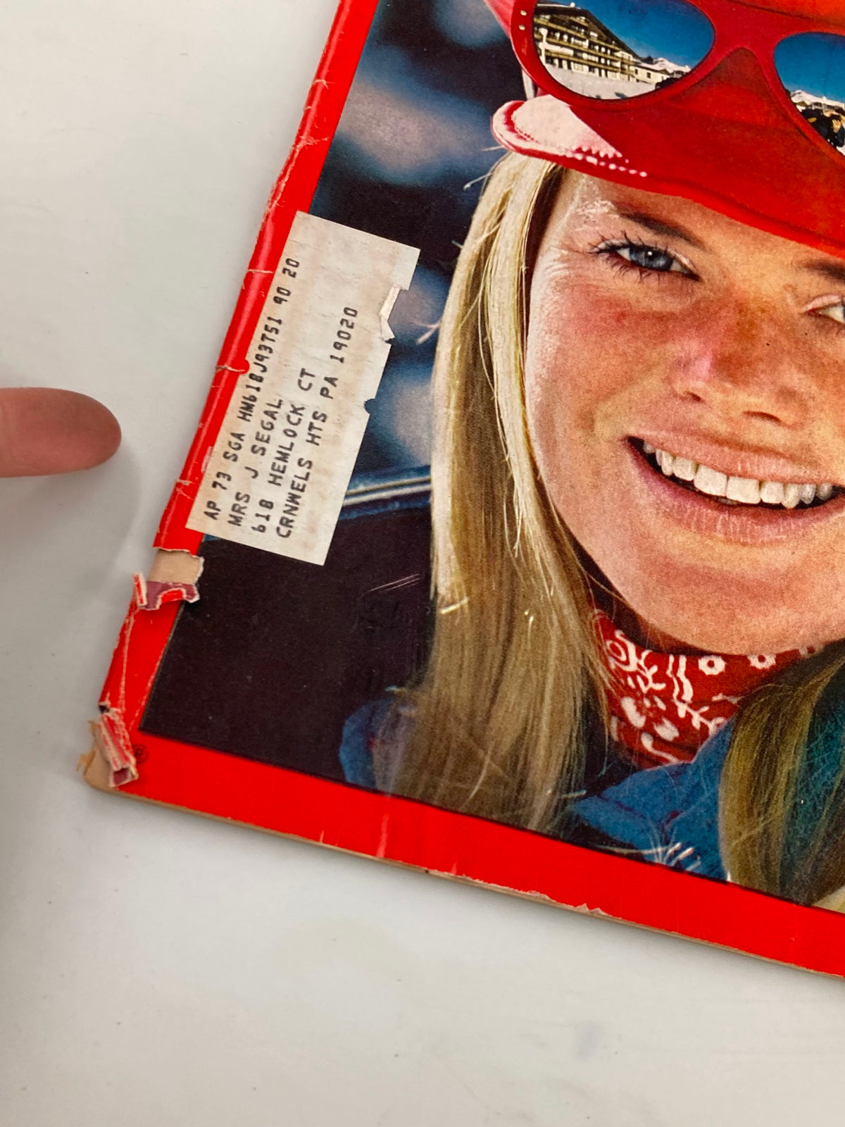 Close-up of the December 25, 1972 Time Magazine cover with visible label and minor wear, showcasing the title 'Holiday On Skis: The Hottest Sport, The Coolest Slopes' and an image of a smiling woman.