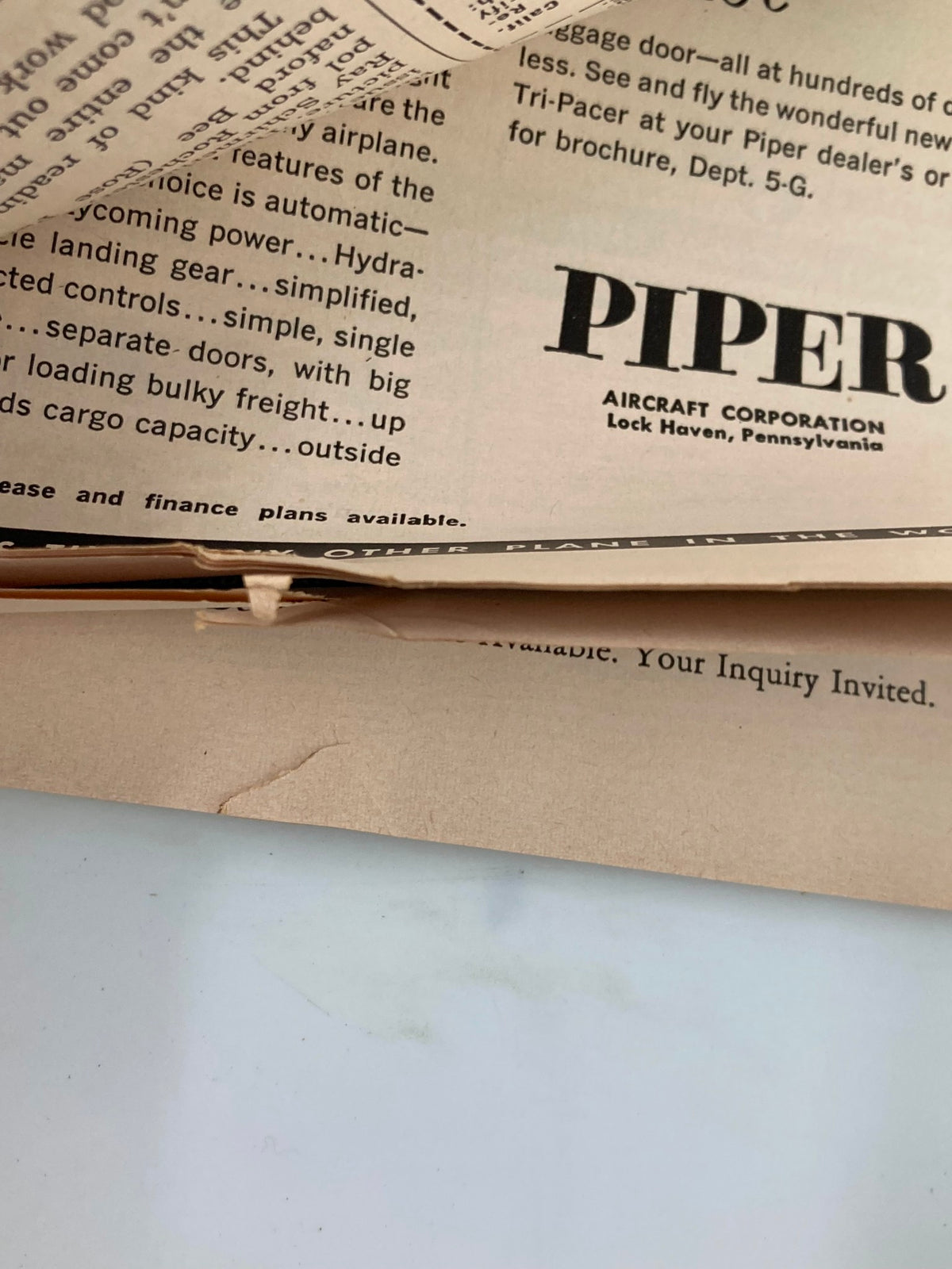 Interior page of the VTG Flying Magazine May 1958 displaying a detailed advertisement, illustrating the magazine's vintage appeal.