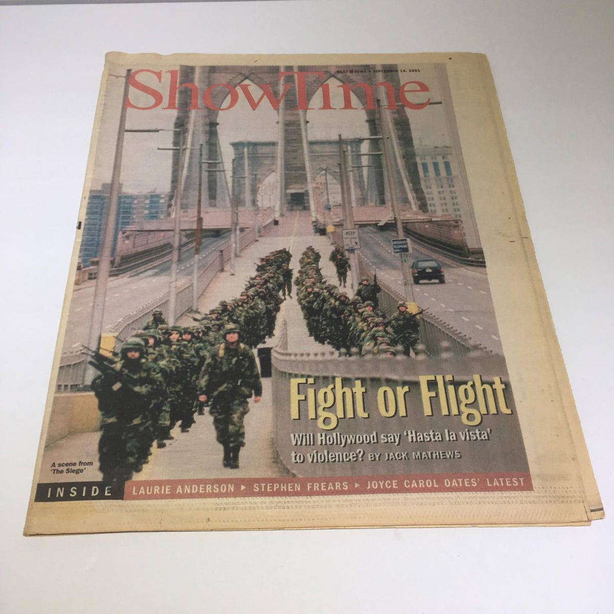 Cover of New York Daily News from September 16, 2001, featuring the headline 'Fight or Flight' with an image of soldiers on a bridge, part of the Showtime edition.