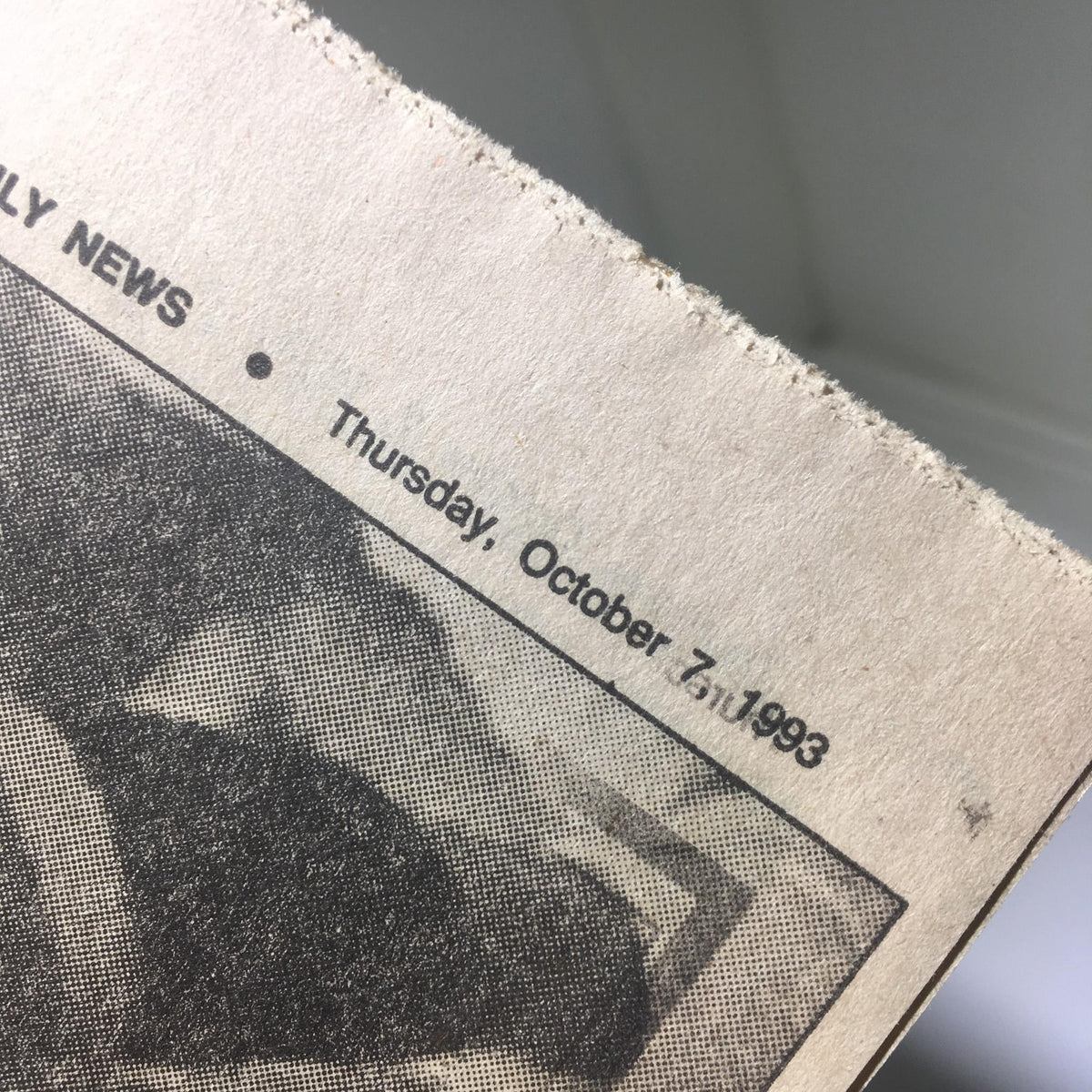 Close-up of the NY Daily News newspaper dated Thursday, October 7, 1993, featuring the title 'Air Time: The Michael Jordan Era' highlighting the significance of Michael Jordan in basketball history.