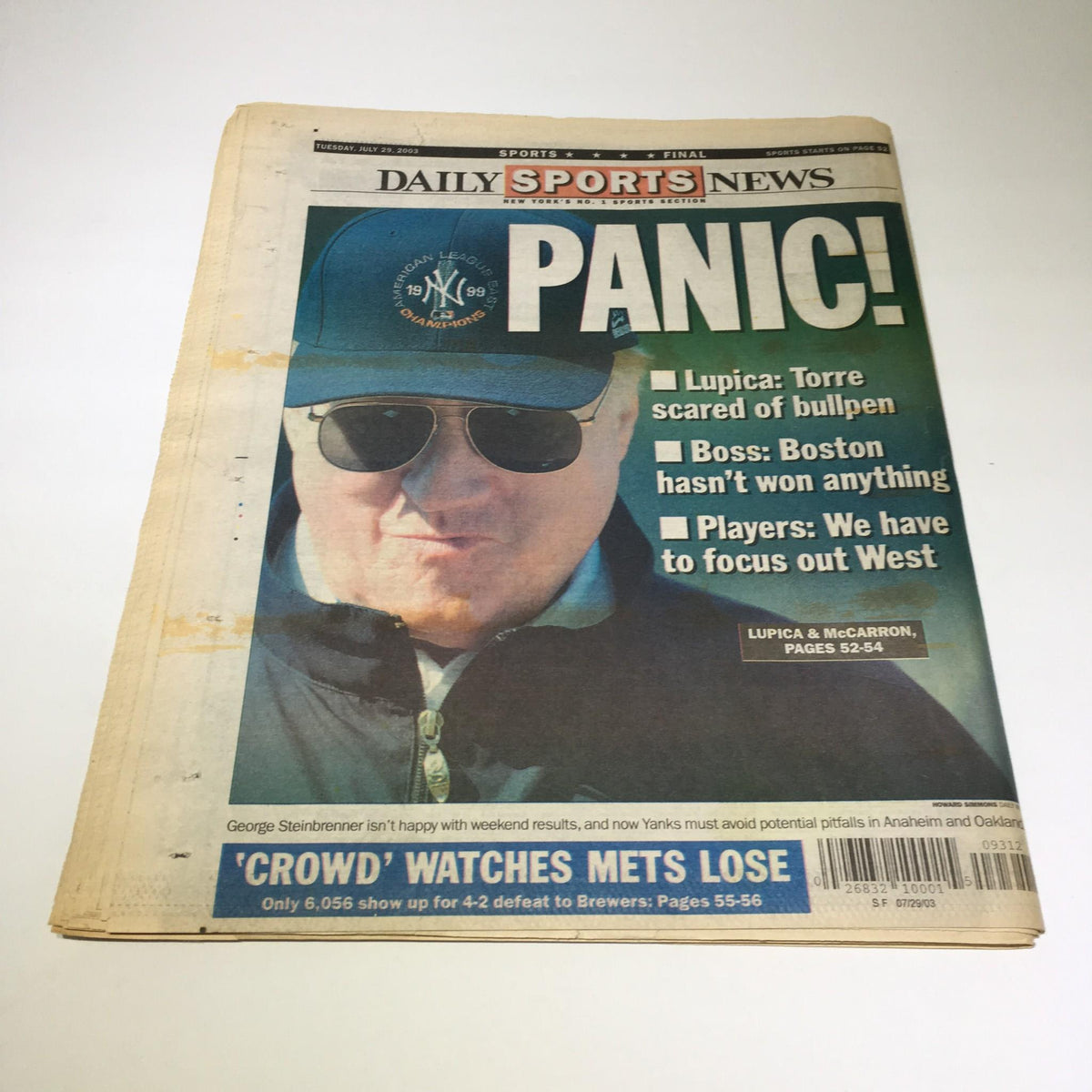 NY Daily News front page dated July 29, 2003, featuring a bold headline 'PANIC!' and an image of a man in sunglasses with a New York Yankees cap. The article discusses sports updates including bullpen concerns and Boston's performance.