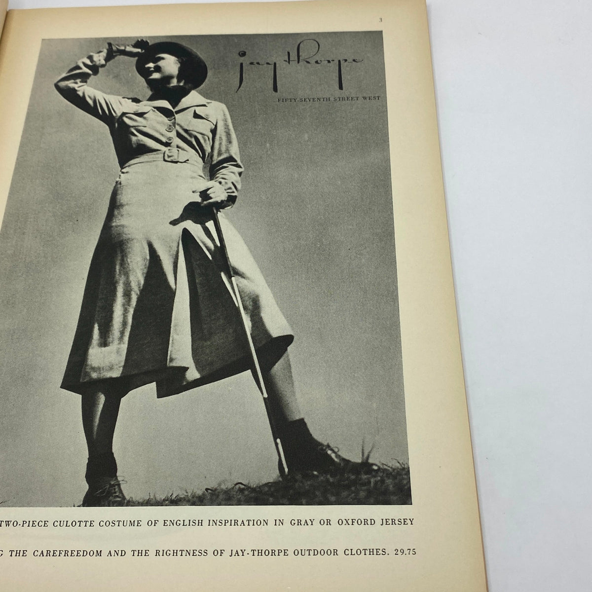 Fashion advertisement page from The New Yorker Complete Magazine April 11, 1936, showcasing a two-piece costume from Jay-Thorpe, highlighting English-inspired design.