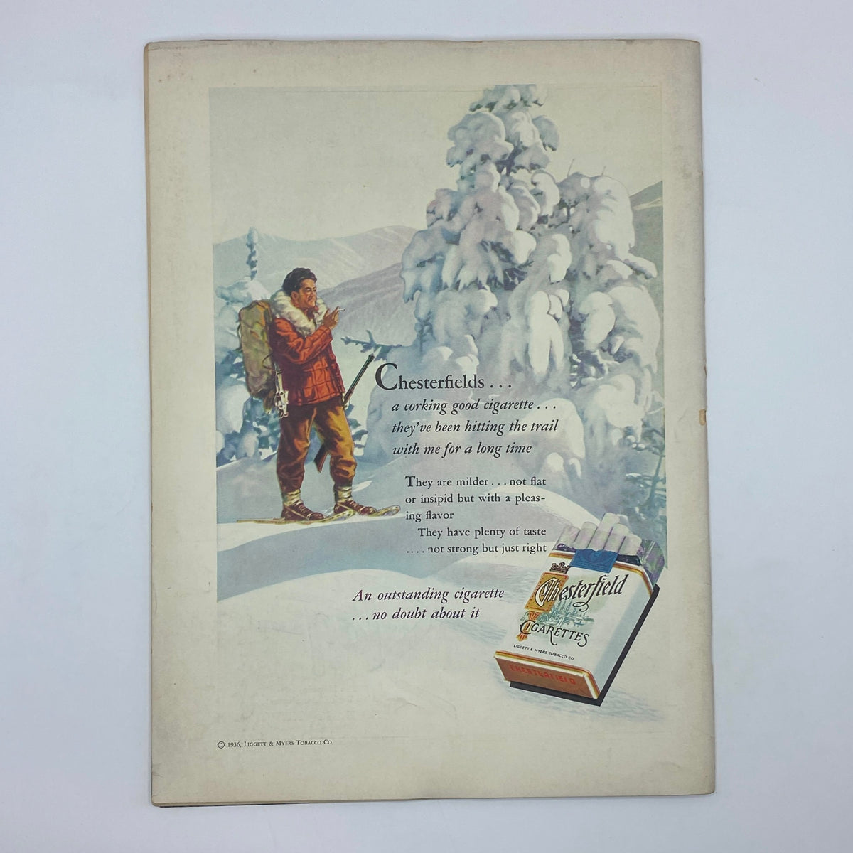The New Yorker Magazine Cover January 11, 1936 features an advertisement for Chesterfield cigarettes, including a winter scene with a hiker, illustrating early 20th-century marketing.