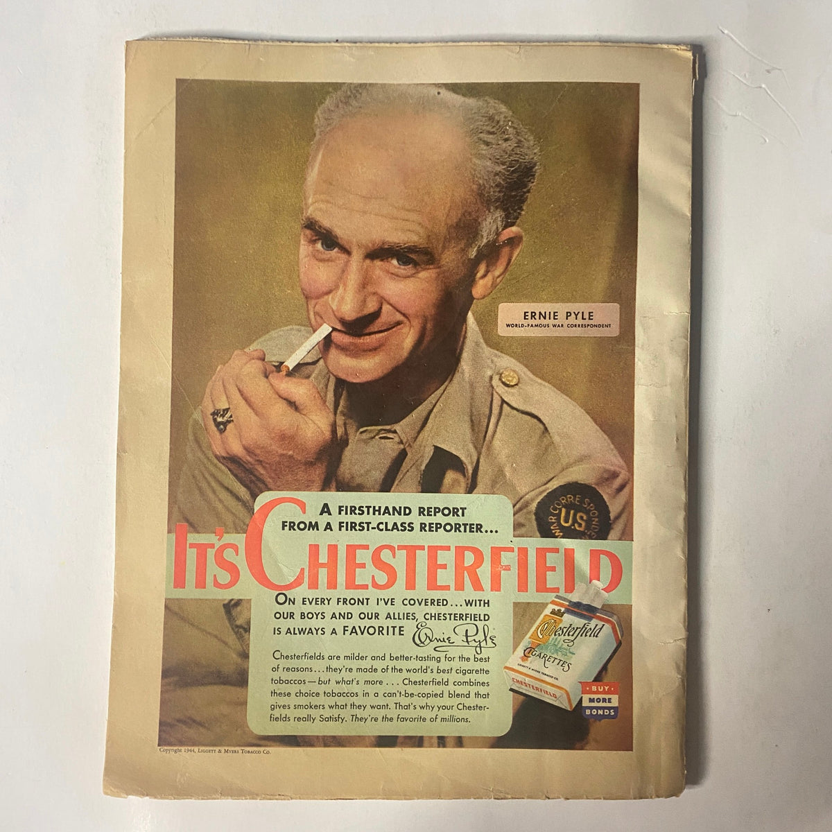 Ernie Pyle on the cover of Chesterfield advertisement in Radio Mirror Magazine March 1944. This color portrait highlights the famous war correspondent, emphasizing his influential role and the magazine's connection to 1940s media.