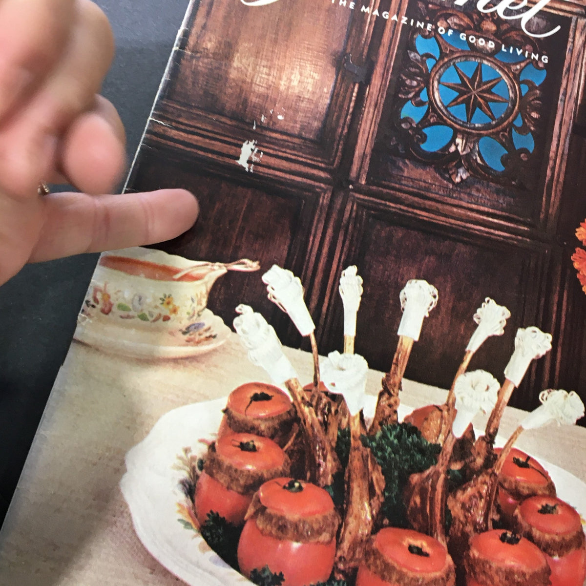 Close-up of the VTG Gourmet Magazine September 1957 cover, highlighting the intricate food presentation with a focus on lamb chops and decorated tomatoes.