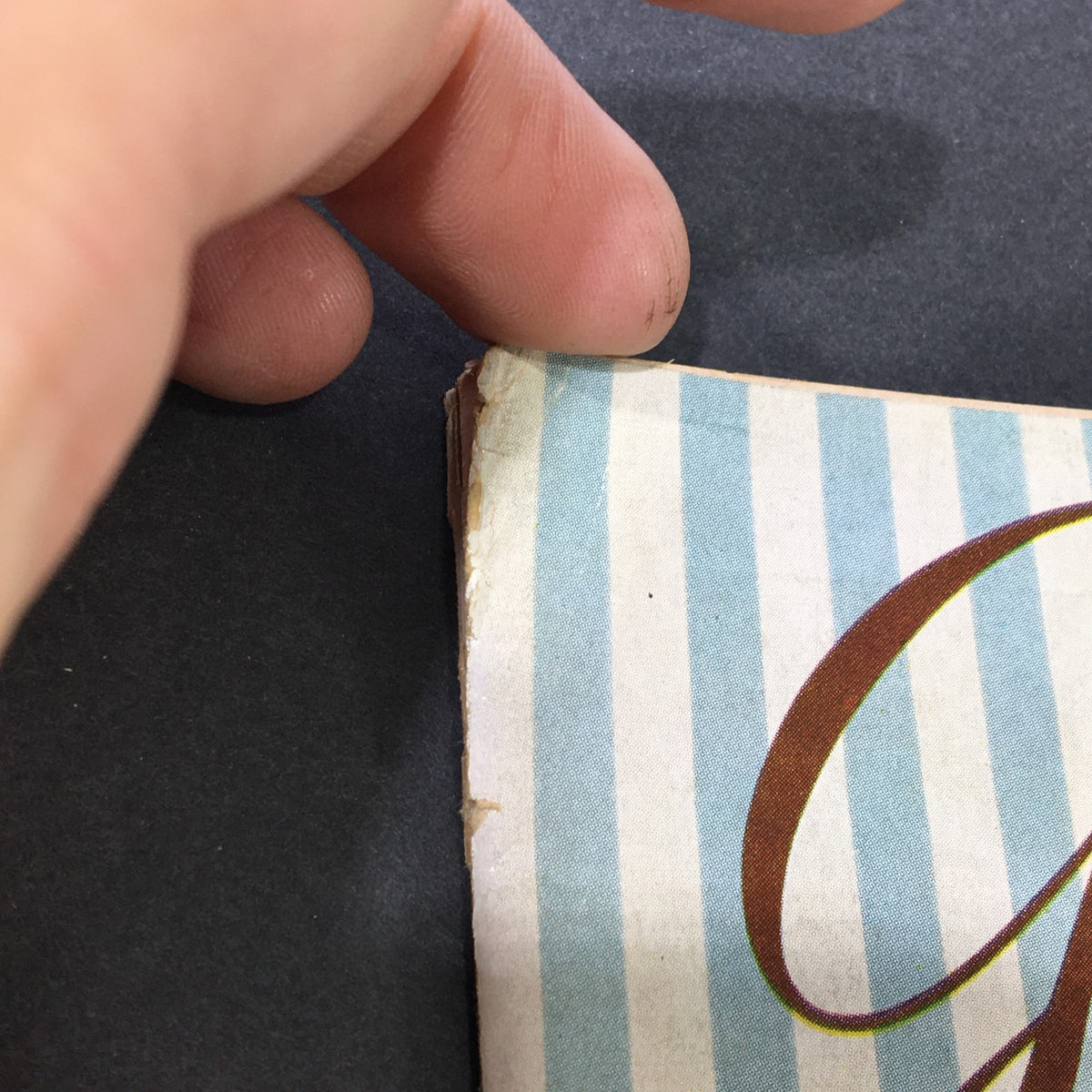 Close-up image of the edge showing minor wear on the cover of VTG Gourmet The Magazine of Good Living March 1958, titled 'The Egg Came First'.