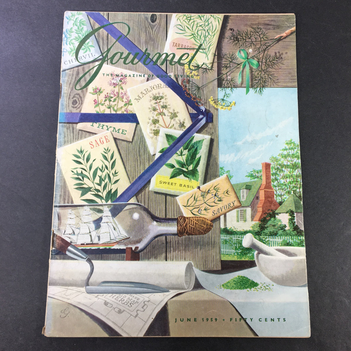 Cover of VTG Gourmet: The Magazine of Good Living, June 1959 issue, featuring an artistic collage of herb seed packets labeled with names such as Thyme, Sage, and Sweet Basil, alongside a bottle with a ship inside and a mortar and pestle, highlighting a theme of culinary exploration.