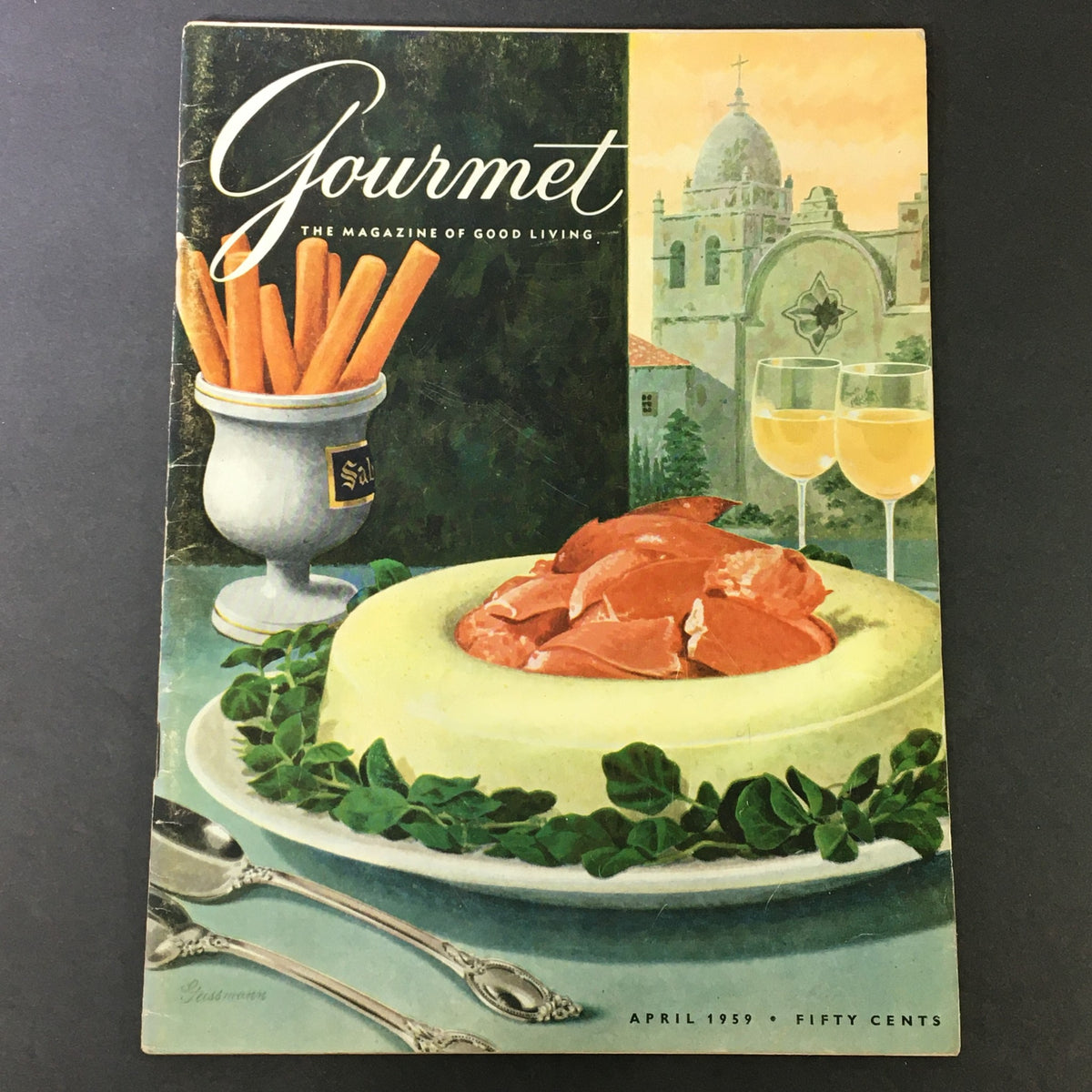VTG Gourmet The Magazine of Good Living, April 1959 cover featuring a vibrant culinary scene with a green gelatin dish topped with lobster, carrots in a silver container, and two glasses of yellow drink, showcasing mid-20th century gourmet aesthetics.