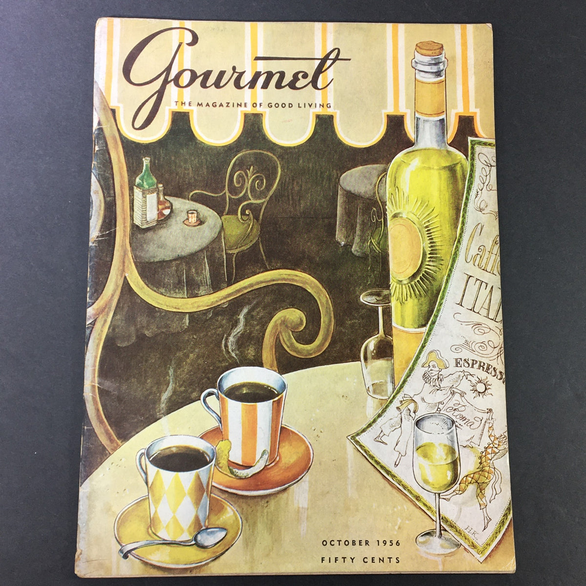 Cover of VTG Gourmet The Magazine of Good Living, October 1956 edition, featuring coffee cups and a picturesque cafe setting, highlighting the theme 'Make Mine Coffee'.