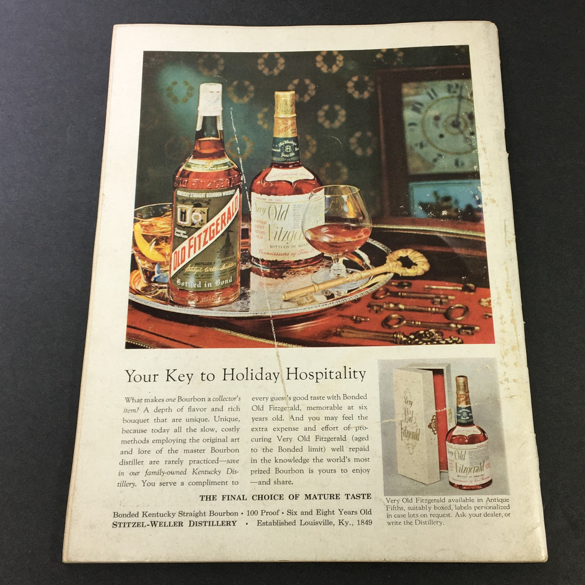 Advertisement from VTG Gourmet The Magazine of Good Living, October 1957, showcasing Old Fitzgerald bourbon bottles and glassware on a decorative tray, highlighting holiday hospitality and vintage beverage culture.