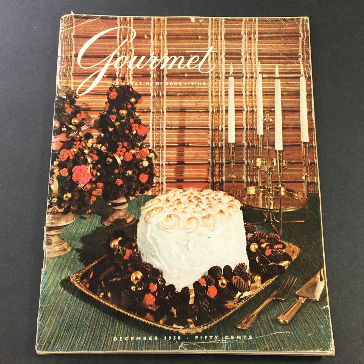 Cover of VTG Gourmet The Magazine of Good Living December 1958 - Seasoned Greetings featuring a decorated holiday table with a cake and festive decorations.