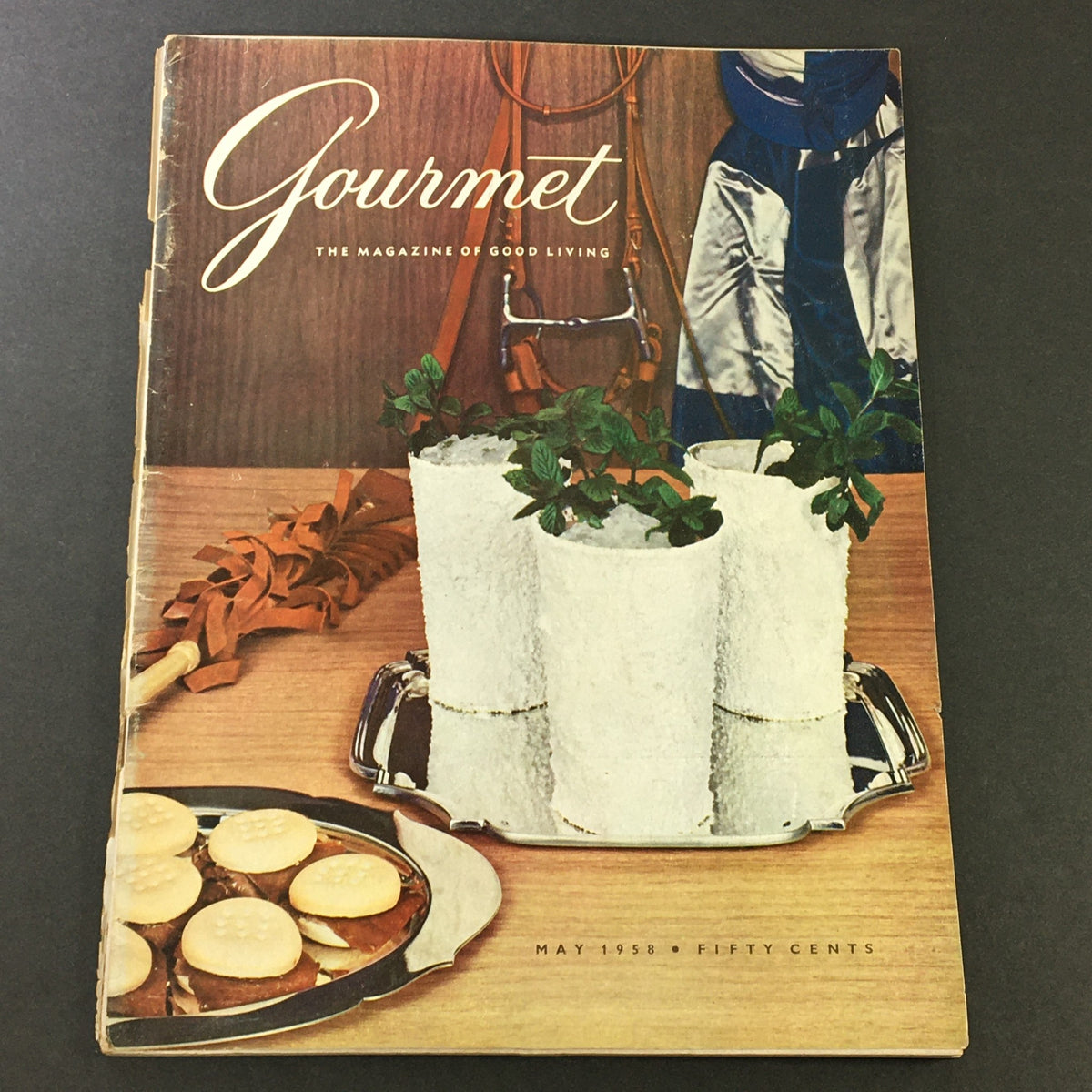 Cover of VTG Gourmet The Magazine of Good Living May 1958 featuring a stylish arrangement with plants and food. This issue is titled 'The Frost is on the Julep'.