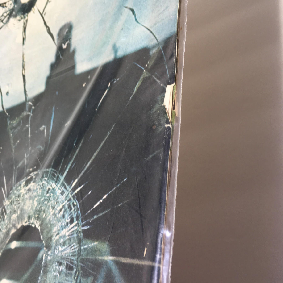 Close-up of Life Magazine cover from August 12, 1966, depicting a shattered window caused by bullets during 'The Texas Sniper' incident.