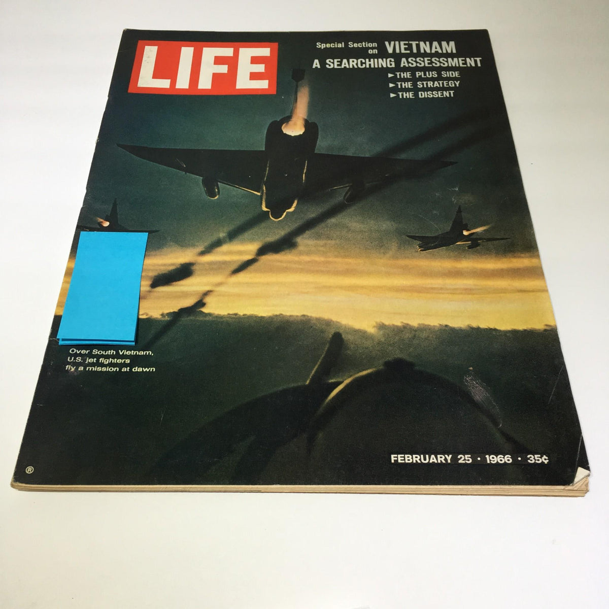Cover of VTG Life Magazine February 25, 1966 featuring U.S. Jet Fighters Fly A Mission at Dawn, showcasing a dramatic aerial scene over South Vietnam with silhouettes of jet fighters against a colorful dawn sky.